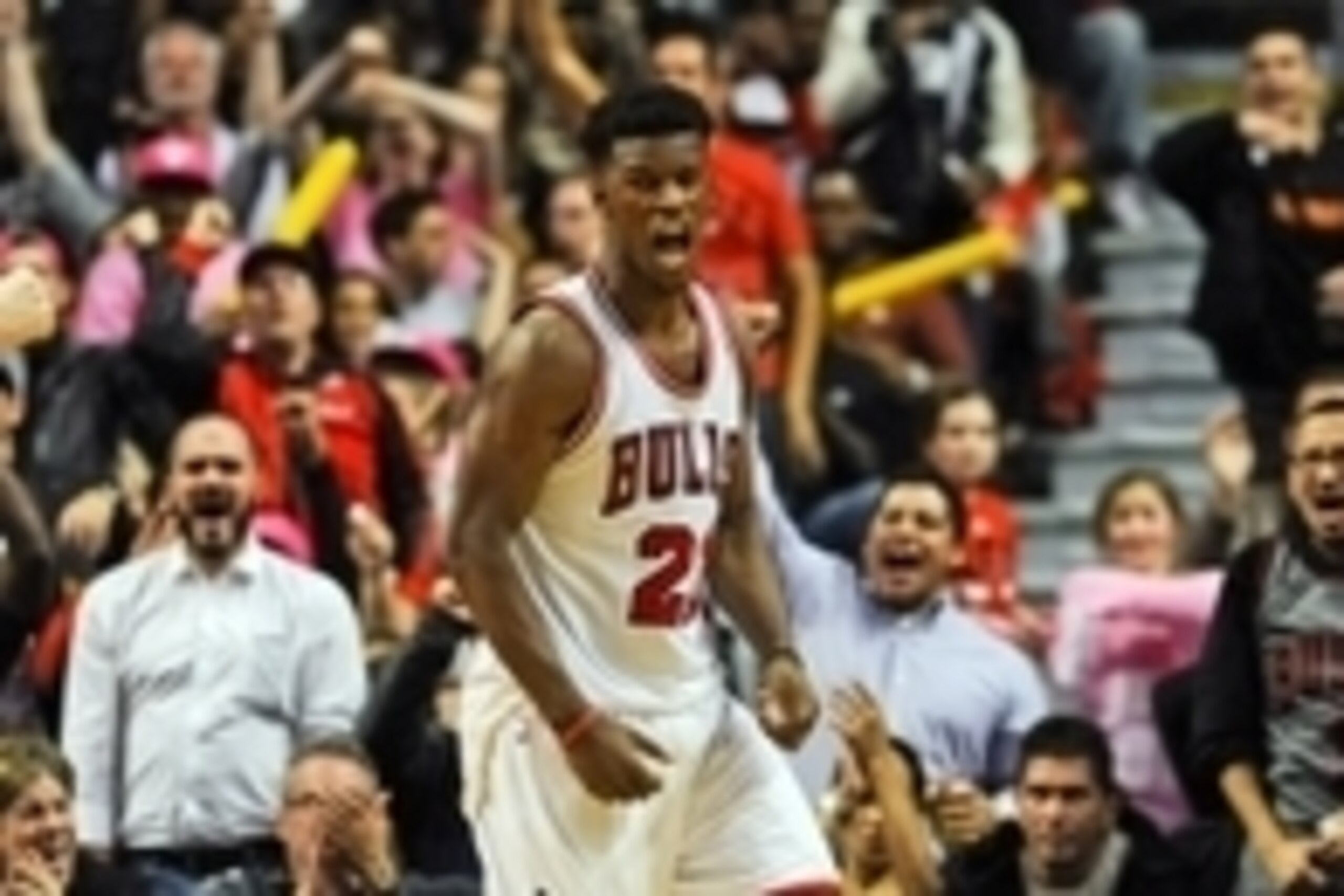 Oct 16, 2014; Chicago, IL, USA; Chicago Bulls guard Jimmy Butler (21) after being fouled by the an Atlanta Hawks player during the second half at the United Center. The Chicago Bulls defeated the Atlanta Hawks 85-84. Mandatory Credit: Matt Marton-USA TODA