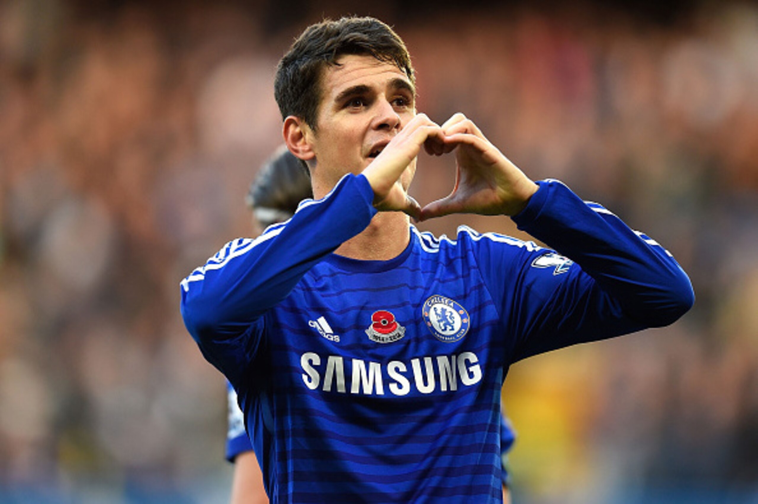 LONDON, ENGLAND - NOVEMBER 1: Oscar of Chelsea celebrates scoring the opening goal during the Barclays Premier League match between Chelsea and Queens Park Rangers at Stamford Bridge on November 1, 2014 in London, England. (Photo by Mike Hewitt/Getty Imag LONDON, ENGLAND - NOVEMBER 1: Oscar of Chelsea celebrates scoring the opening goal during the Barclays Premier League match between Chelsea and Queens Park Rangers at Stamford Bridge on November 1, 2014 in London, England. (Photo by Mike Hewitt/Getty Imag