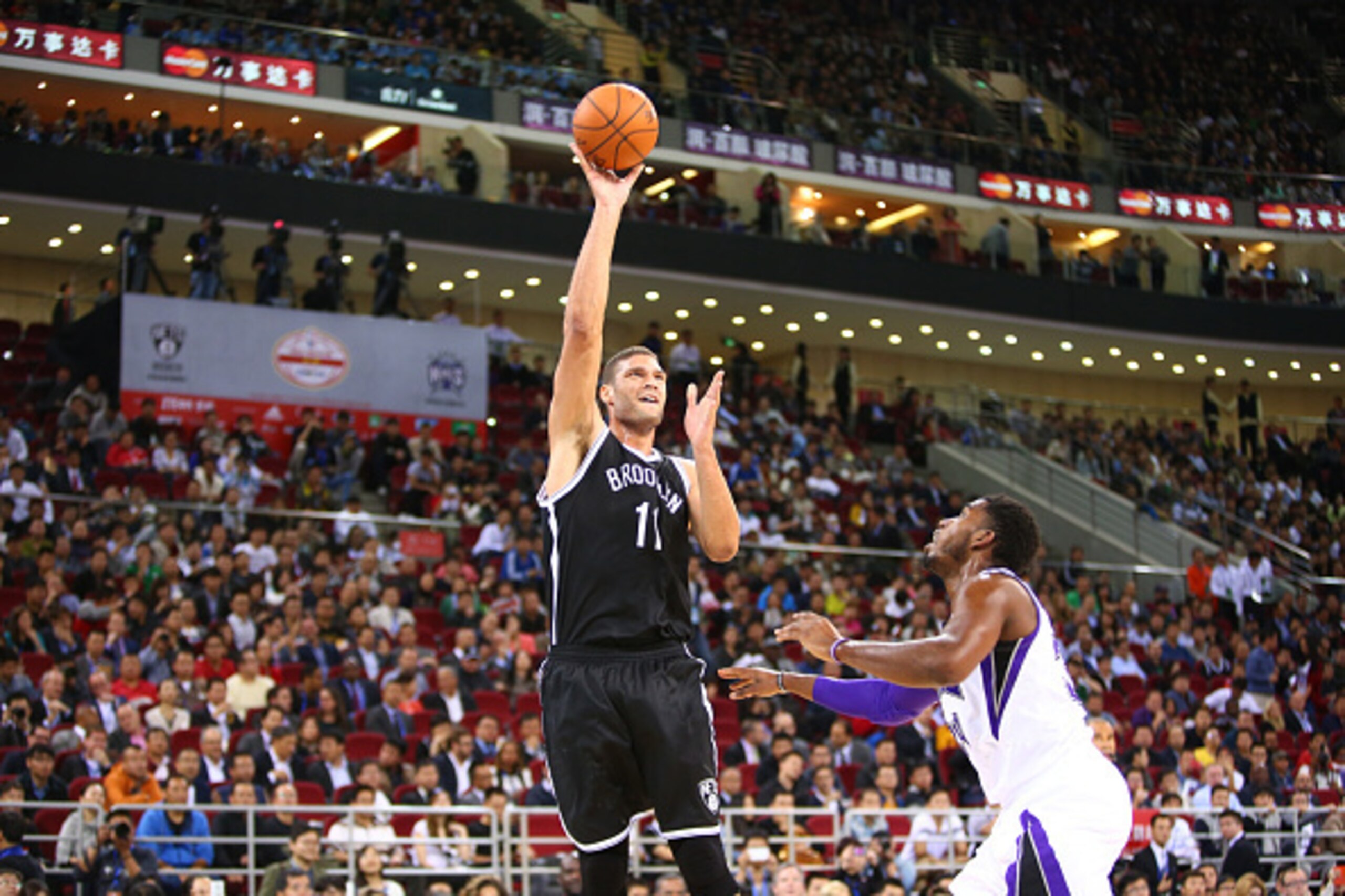 BEIJING, CHINA - OCTOBER 15:  Brook Lopez #11 of the Brooklyn Nets shoots against the Sacramento Kings during the 2014 NBA Global Games at the MasterCard Center on October 15, 2014 in Beijing, China. NOTE TO USER: User expressly acknowledges and agrees th