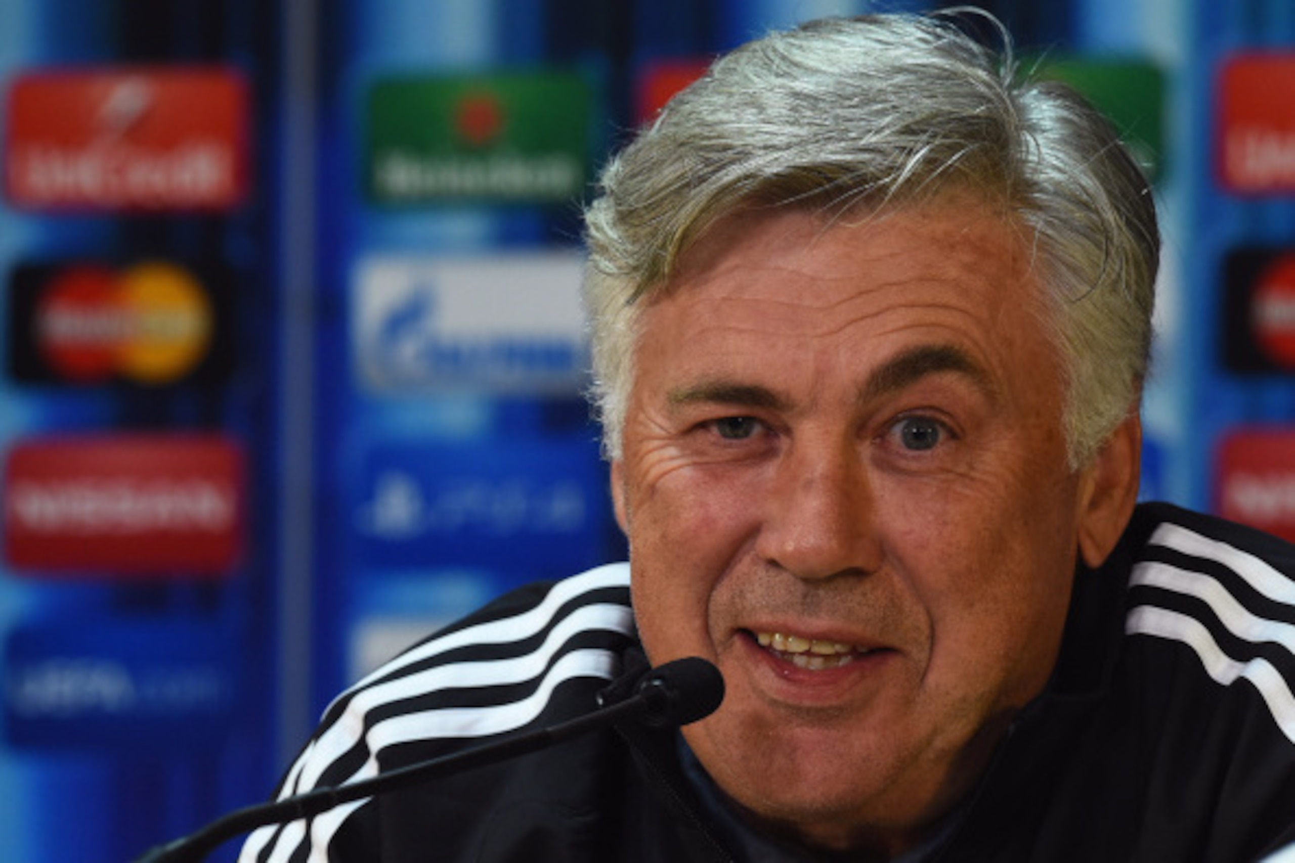 CARDIFF, WALES - AUGUST 11:  In this handout image provided by UEFA, Real Madrid Manager Carlo Ancelotti during the Real Madrid press conference at Cardiff City Stadium on August 11, 2014 in Cardiff, Wales.  (Photo by Handout/UEFA via Getty Images)