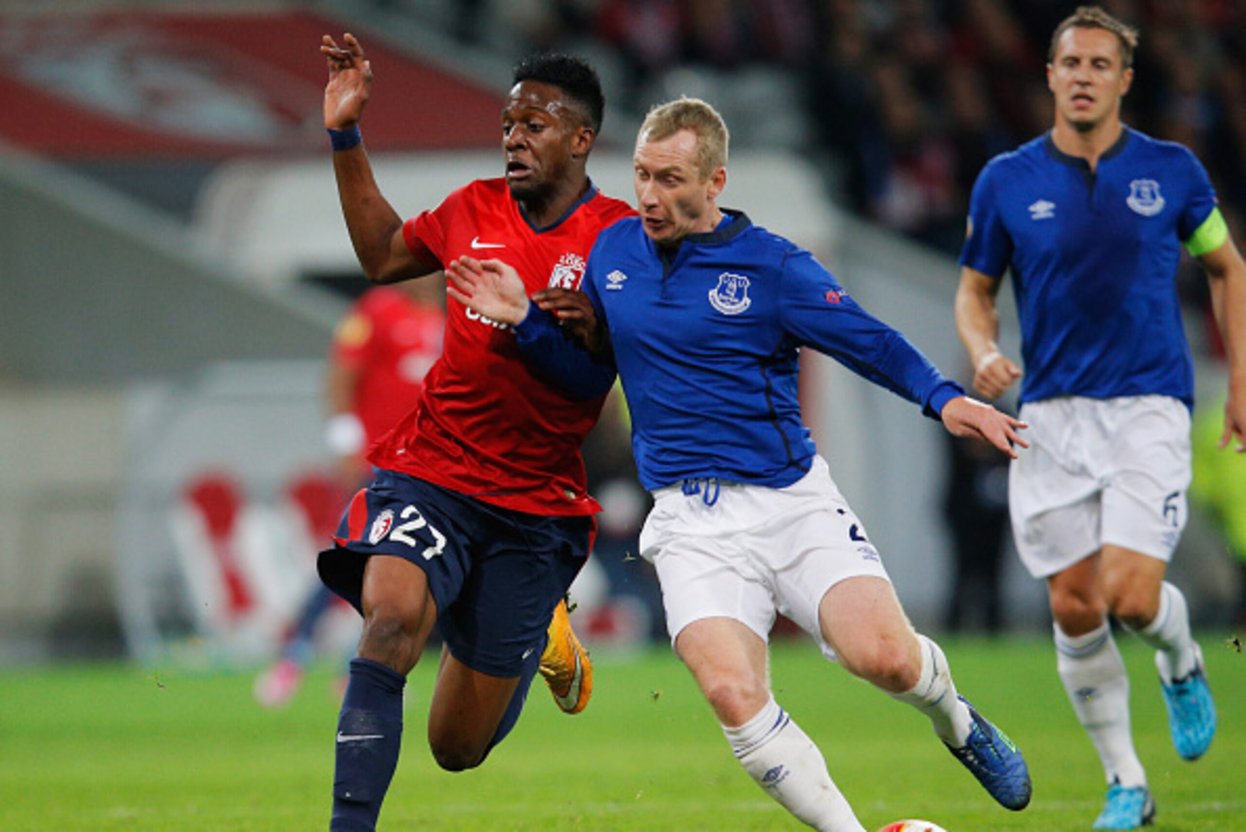 LILLE, FRANCE - OCTOBER 23:  Tony Hibbert of Everton (2) and Divock Origi of Lille battle for the ball during the UEFA Europa League Group H match between LOSC Lille and Everton at Grand Stade Lille Metropole on October 23, 2014 in Lille, France.  (Photo 