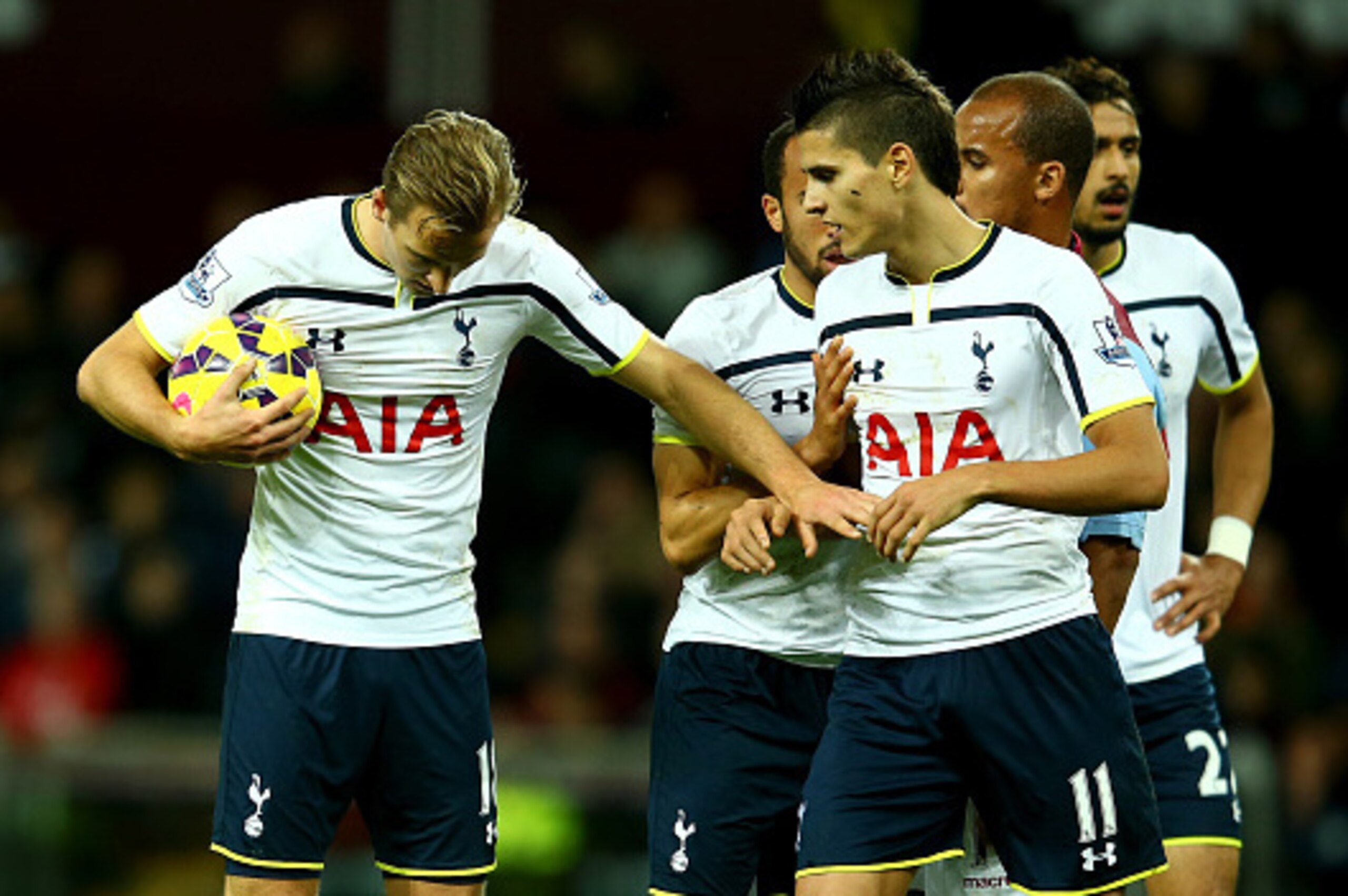 BIRMINGHAM, ENGLAND - NOVEMBER 02:  Harry Kane of Spurs keeps hold of the ball from team mate Erik Lamela to take the match winning freekick during the Barclays Premier League match between Aston Villa and Tottenham Hotspur at Villa Park on November 2, 20