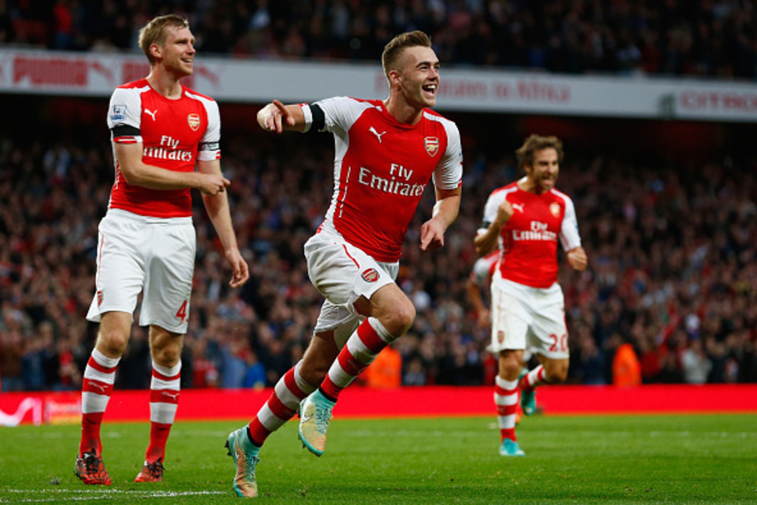 LONDON, ENGLAND - NOVEMBER 01:  Calum Chambers of Arsenal celebrates scoring the second goal during the Premier League match between Manchester City and Manchester United at Etihad Stadium on November 2, 2014 in Manchester, England.  (Photo by Julian Finn