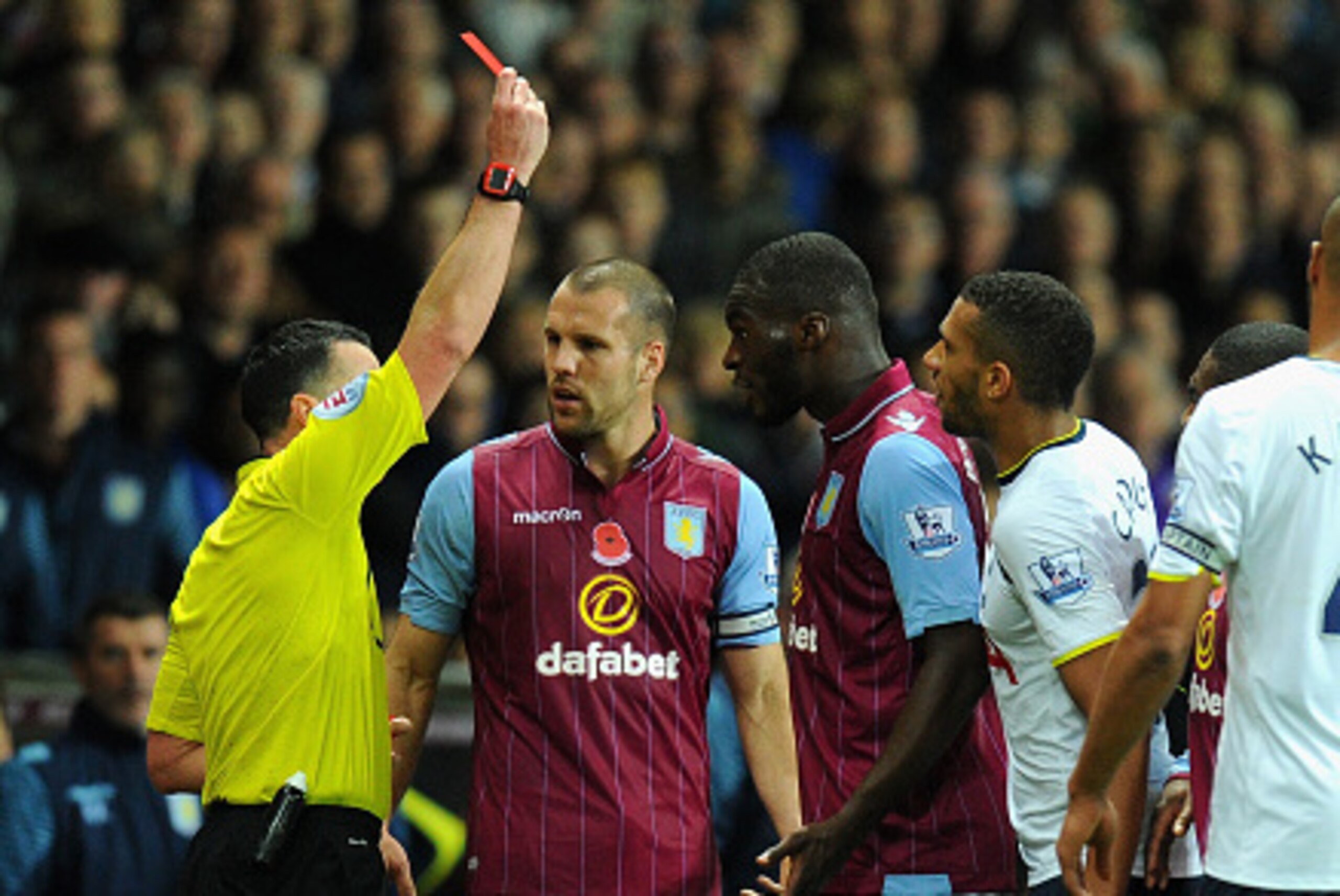 BIRMINGHAM, ENGLAND - NOVEMBER 02:  Villa player Christian Benteke (r) is sent off during the Barclays Premier League match between Aston Villa and Tottenham Hotspur at Villa Park on November 2, 2014 in Birmingham, England.  (Photo by Stu Forster/Getty Im