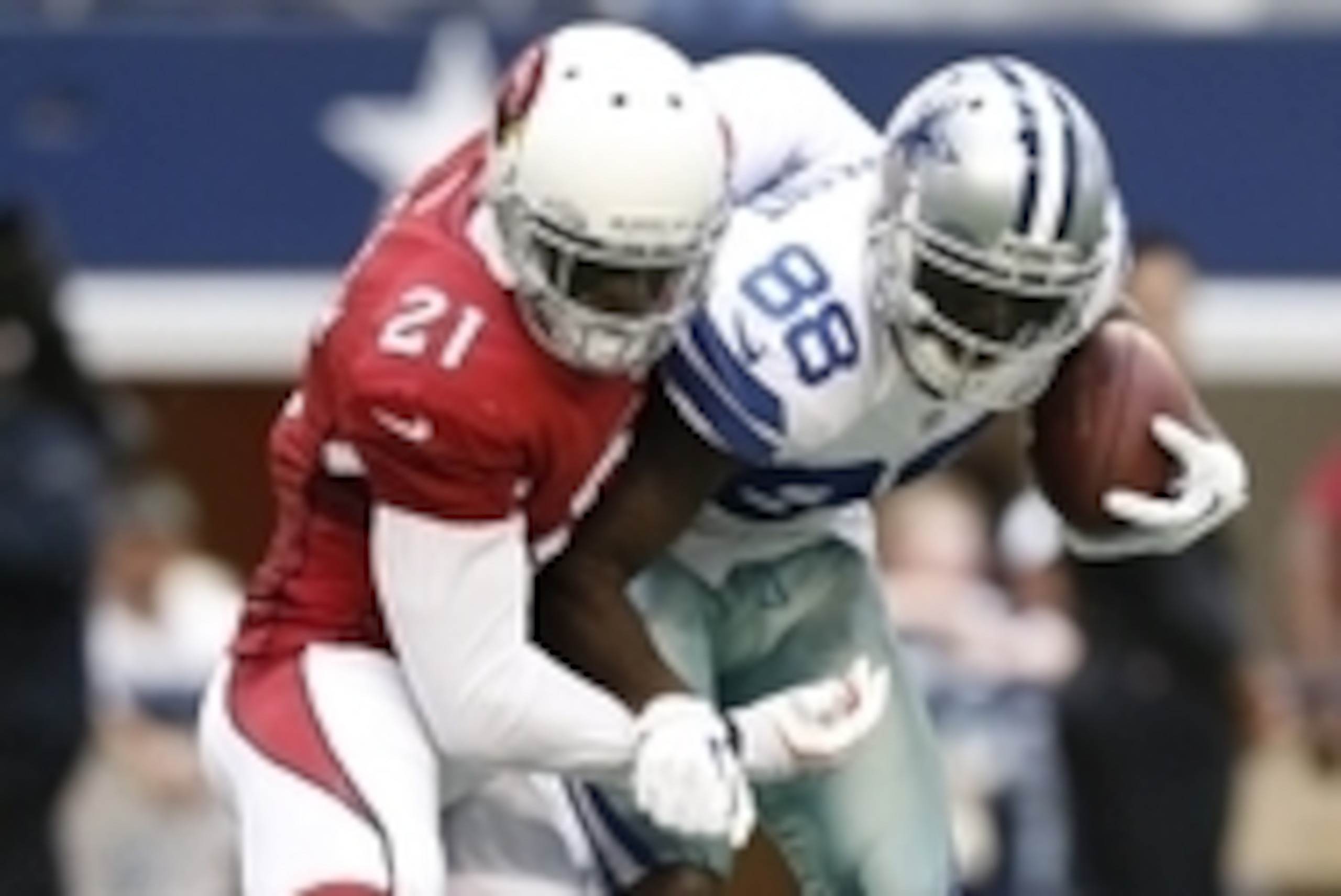 Nov 2, 2014; Arlington, TX, USA; Dallas Cowboys receiver Dez Bryant (88) runs after a reception against Arizona Cardinals cornerback Patrick Peterson (21)  at AT&T Stadium. Mandatory Credit: Matthew Emmons-USA TODAY Sports