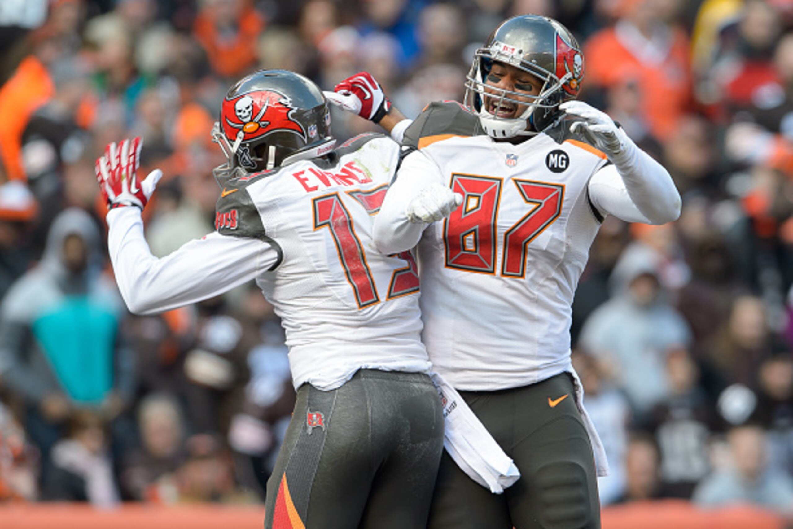 CLEVELAND, OH - NOVEMBER 2: Wide receiver Mike Evans #13 celebrates with tight end Austin Seferian-Jenkins #87 of the Tampa Bay Buccaneers after Evans caught a touchdown pass during the first half against the Cleveland Browns at FirstEnergy Stadium on Nov
