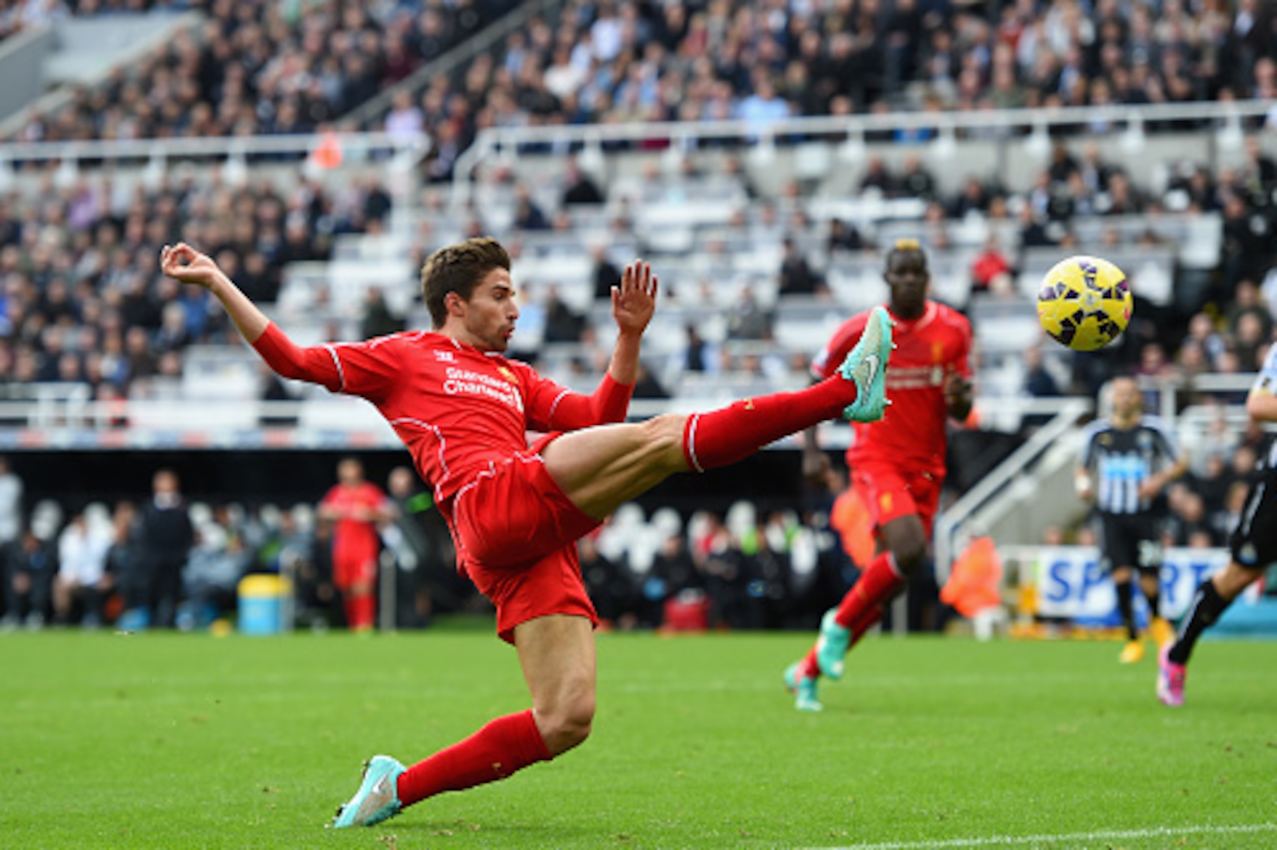 NEWCASTLE UPON TYNE, ENGLAND - NOVEMBER 01:  Liverpool player Fabio Borini in action during the Barclays Premier League match between Newcastle United and Liverpool at St James' Park on November 1, 2014 in Newcastle upon Tyne, England.  (Photo by Stu Fors