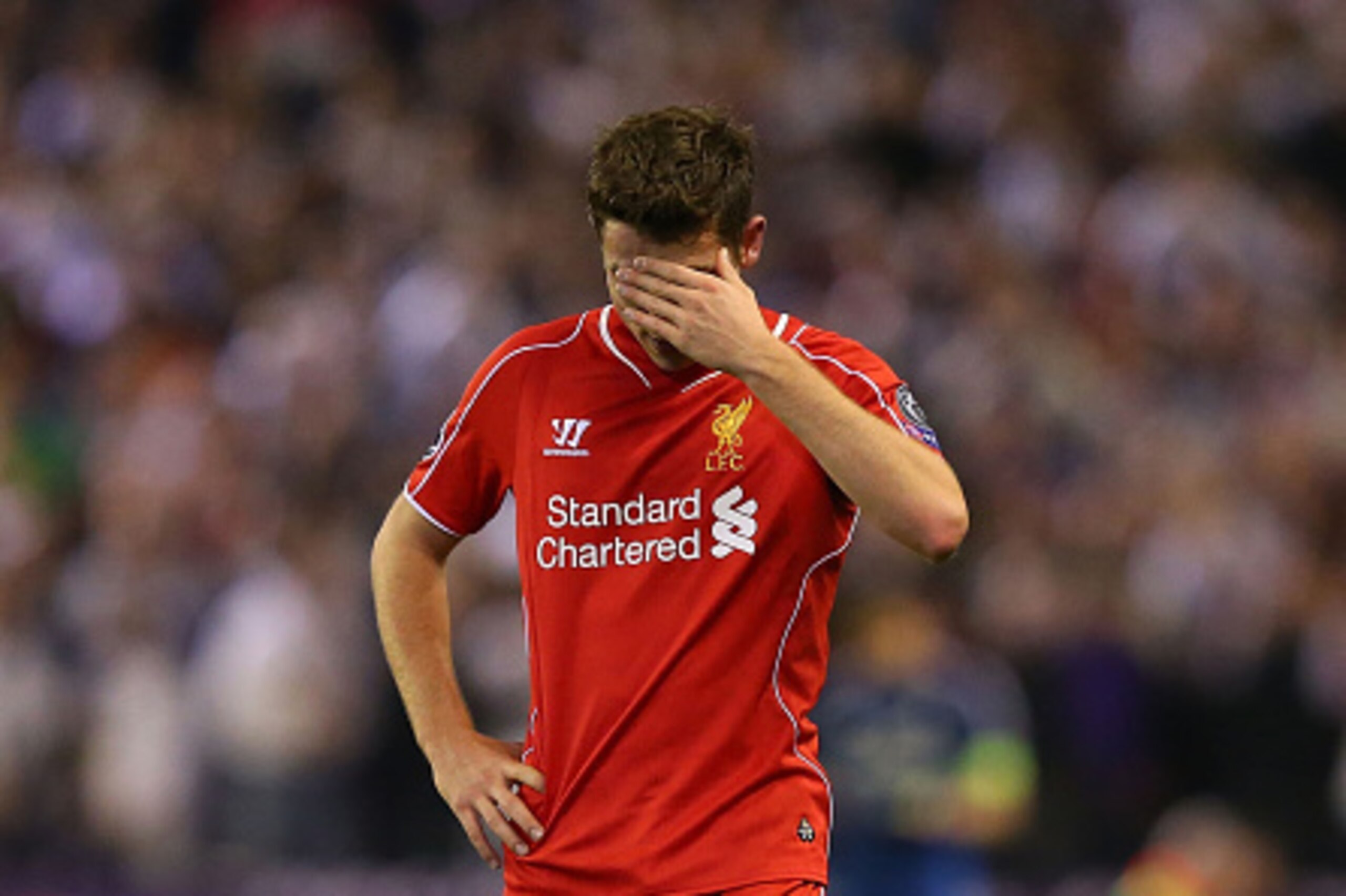 LIVERPOOL, ENGLAND - OCTOBER 22:  Joe Allen of Liverpool looks dejected at the end of the UEFA Champions League Group B match between Liverpool and Real Madrid CF on October 22, 2014 in Liverpool, United Kingdom.  (Photo by Alex Livesey/Getty Images)