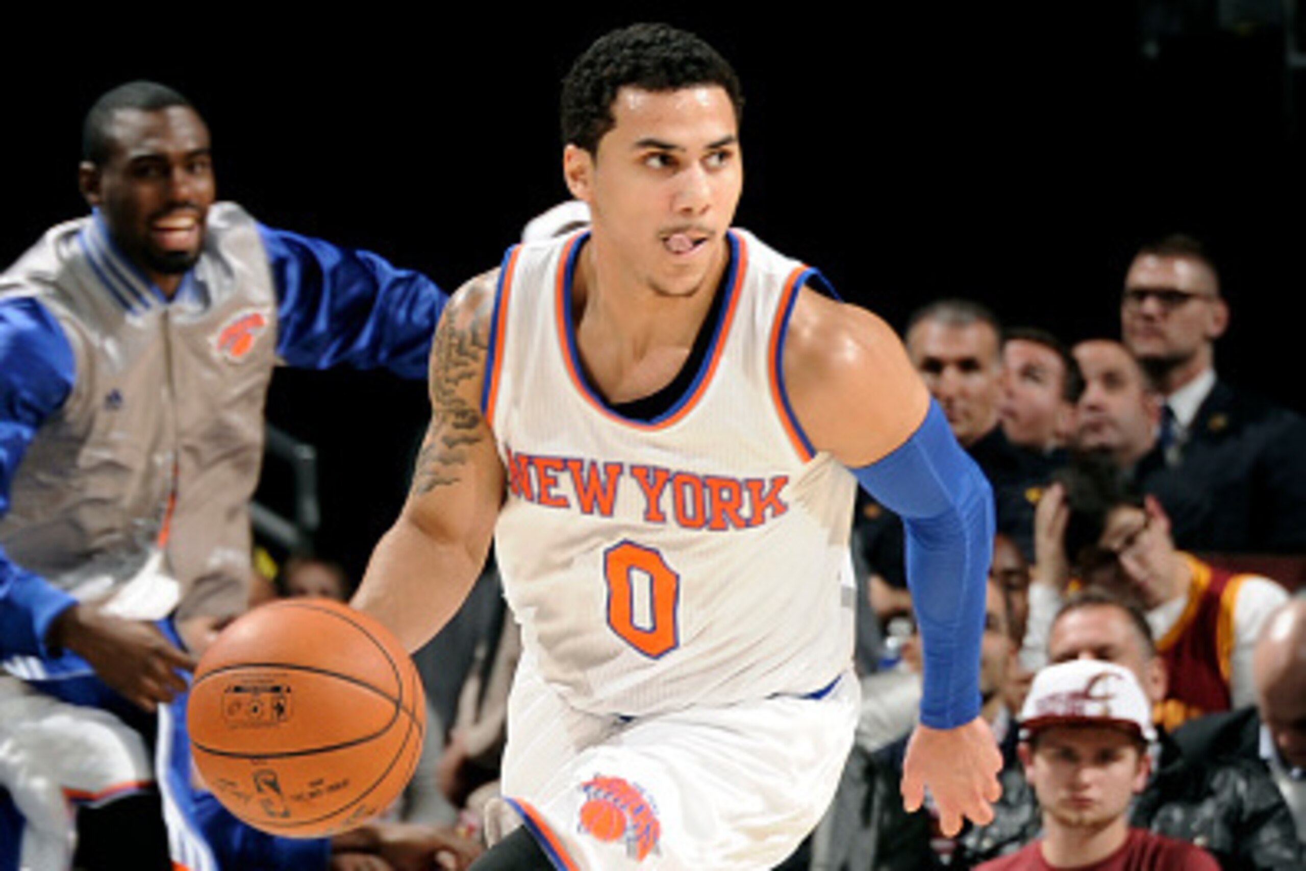 CLEVELAND, OH - OCTOBER 30: Shane Larkin #0 of the New York Knicks drives against the Cleveland Cavaliers on October 30, 2014 in Cleveland, Ohio. NOTE TO USER: User expressly acknowledges and agrees that, by downloading and/or using this photograph, user CLEVELAND, OH - OCTOBER 30: Shane Larkin #0 of the New York Knicks drives against the Cleveland Cavaliers on October 30, 2014 in Cleveland, Ohio. NOTE TO USER: User expressly acknowledges and agrees that, by downloading and/or using this photograph, user