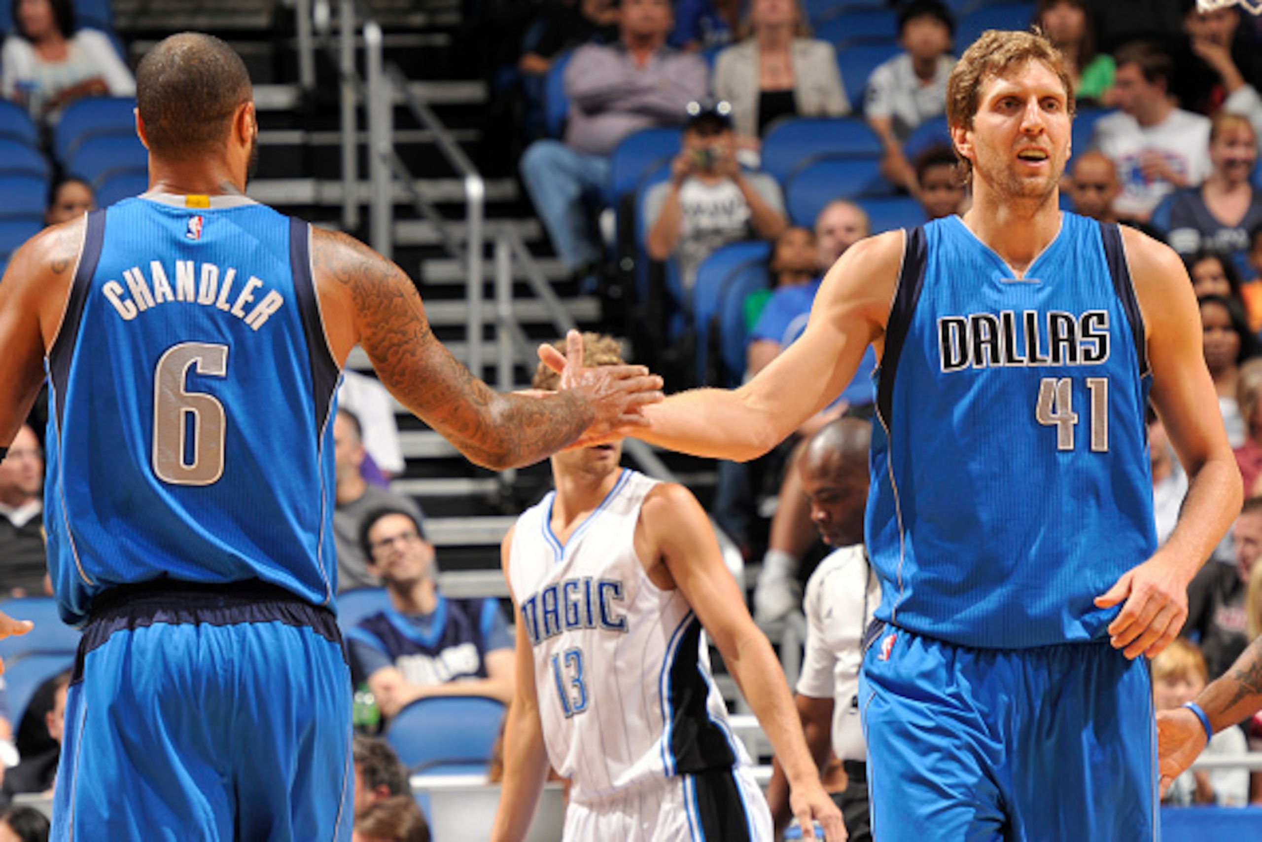 ORLANDO, FL - OCTOBER 24: Tyson Chandler #6 and Dirk Nowitzki #41 of the Dallas Mavericks during the game against the Orlando Magic on October 24, 2014 at Amway Center in Orlando, Florida. NOTE TO USER: User expressly acknowledges and agrees that, by down