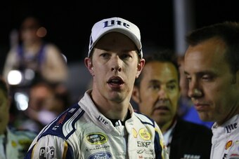 FORT WORTH, TX - NOVEMBER 02:  Brad Keselowski, driver of the #2 Miller Lite Ford, reacts after being involved in a fight on pit road with Jeff Gordon, driver of the #24 Drive To End Hunger Chevrolet, following the NASCAR Sprint Cup Series AAA Texas 500 a