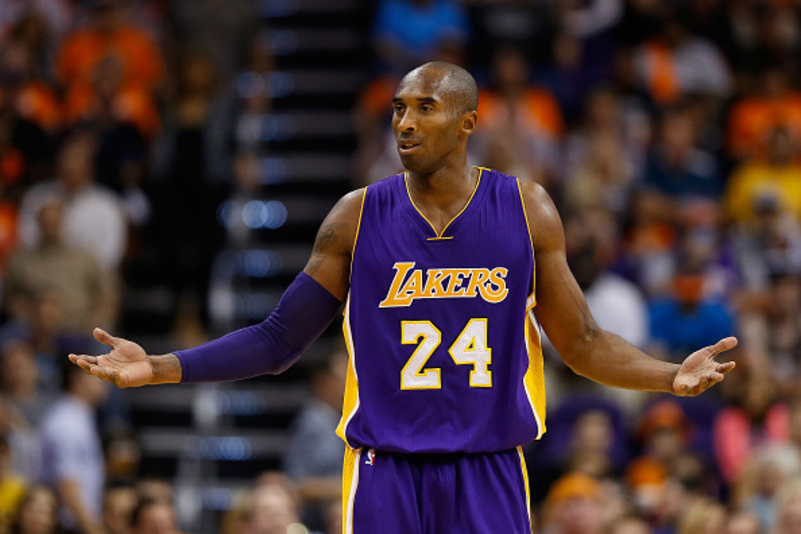 PHOENIX, AZ - OCTOBER 29:  Kobe Bryant #24 of the Los Angeles Lakers reacts to a foul call during the second half of the NBA game against the Phoenix Suns at US Airways Center on October 29, 2014 in Phoenix, Arizona.  The Suns defeated the Lakers 119-99. 