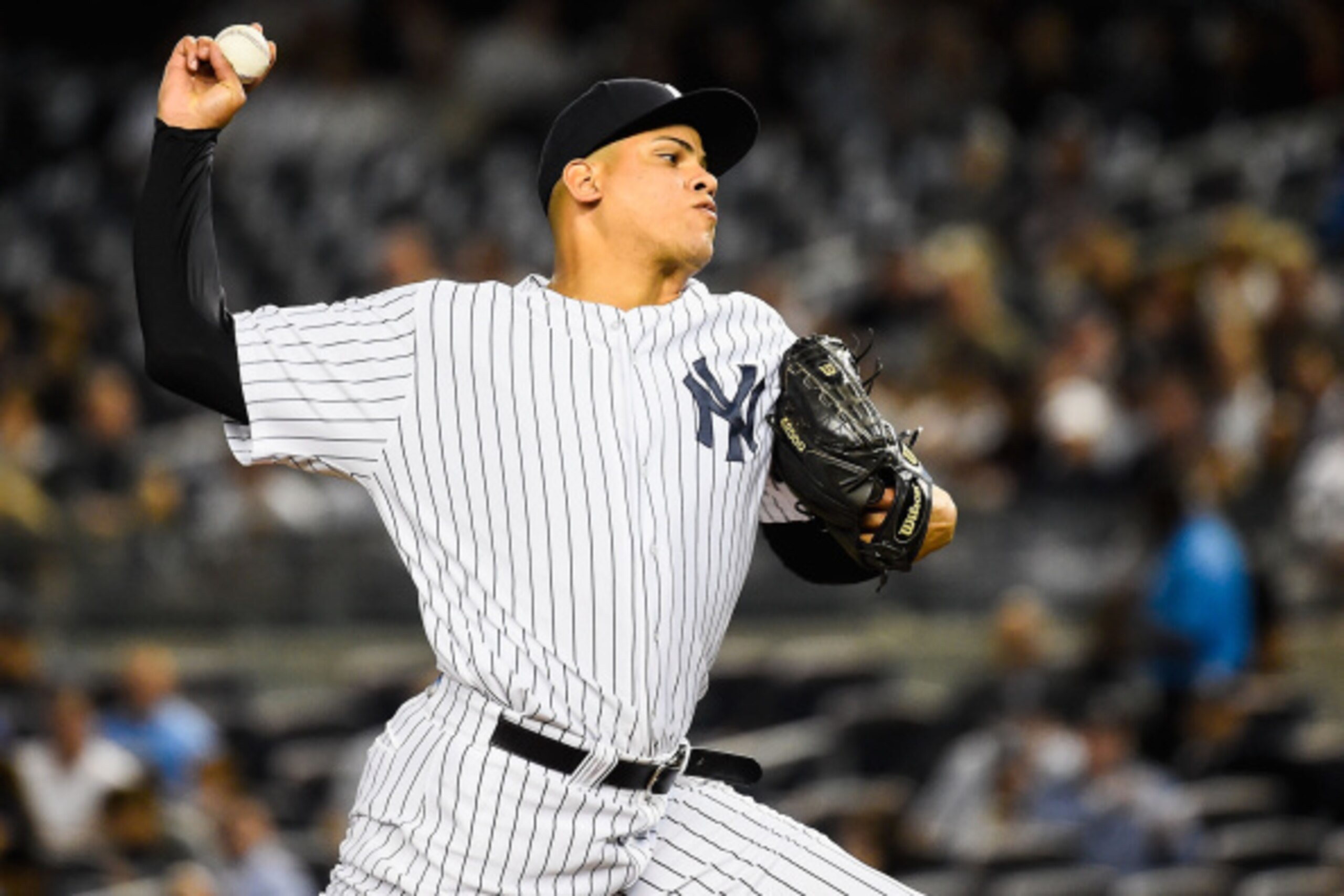 NEW YORK, NY - SEPTEMBER 10: Dellin Betances #68 of the New York Yankees throws a pitch during a game agasint the Tampa Bay Rays at Yankee Stadium on September 10, 2014 in the Bronx borough of New York City.  (Photo by Alex Goodlett/Getty Images)