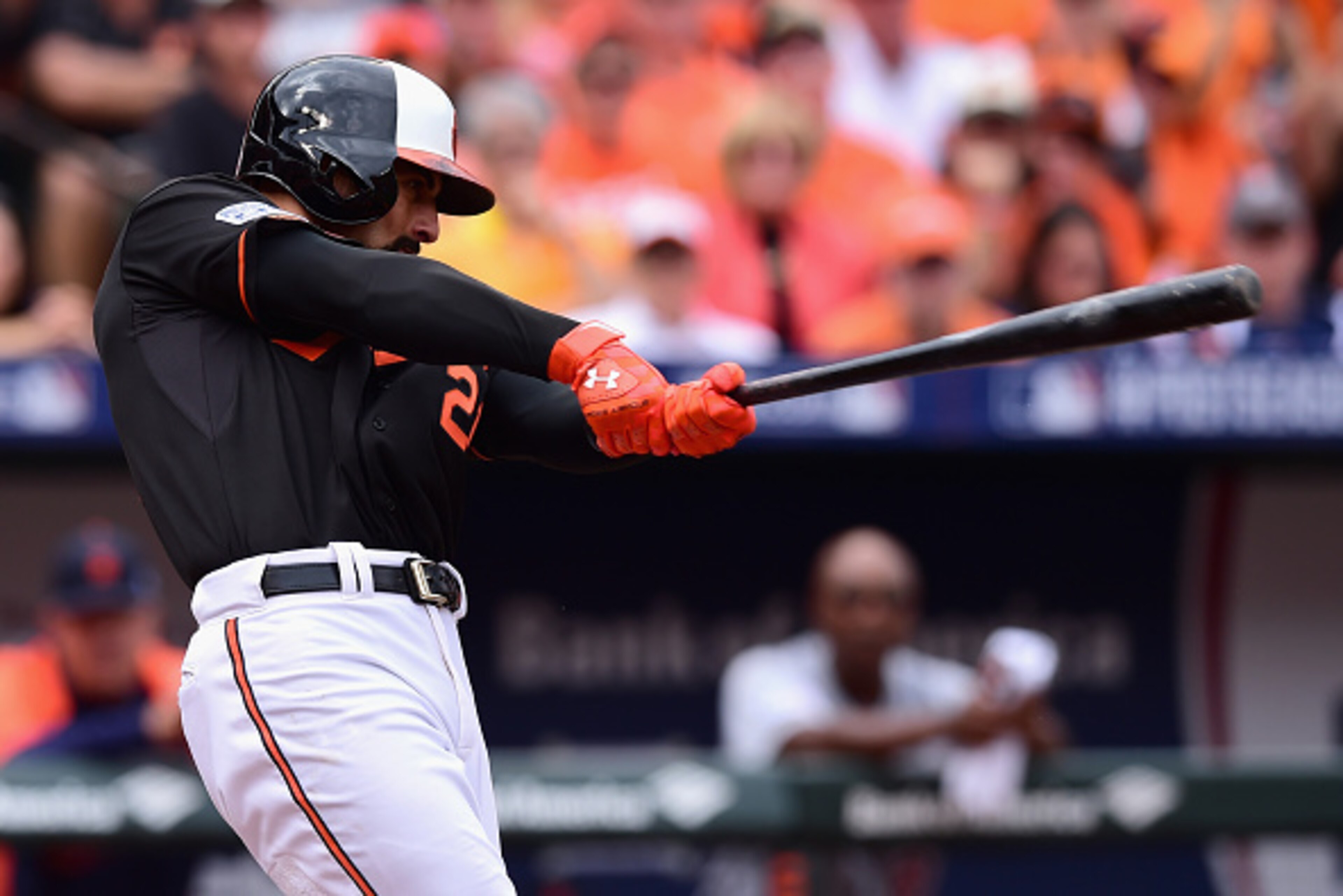 BALTIMORE, MD - OCTOBER 03: Nick Markakis #21 of the Baltimore Orioles hits a two run home run to right field scoring teammate Jonathan Schoop #6 in the third inning against Justin Verlander #35 of the Detroit Tigers during Game Two of the American Leagu BALTIMORE, MD - OCTOBER 03: Nick Markakis #21 of the Baltimore Orioles hits a two run home run to right field scoring teammate Jonathan Schoop #6 in the third inning against Justin Verlander #35 of the Detroit Tigers during Game Two of the American Leagu