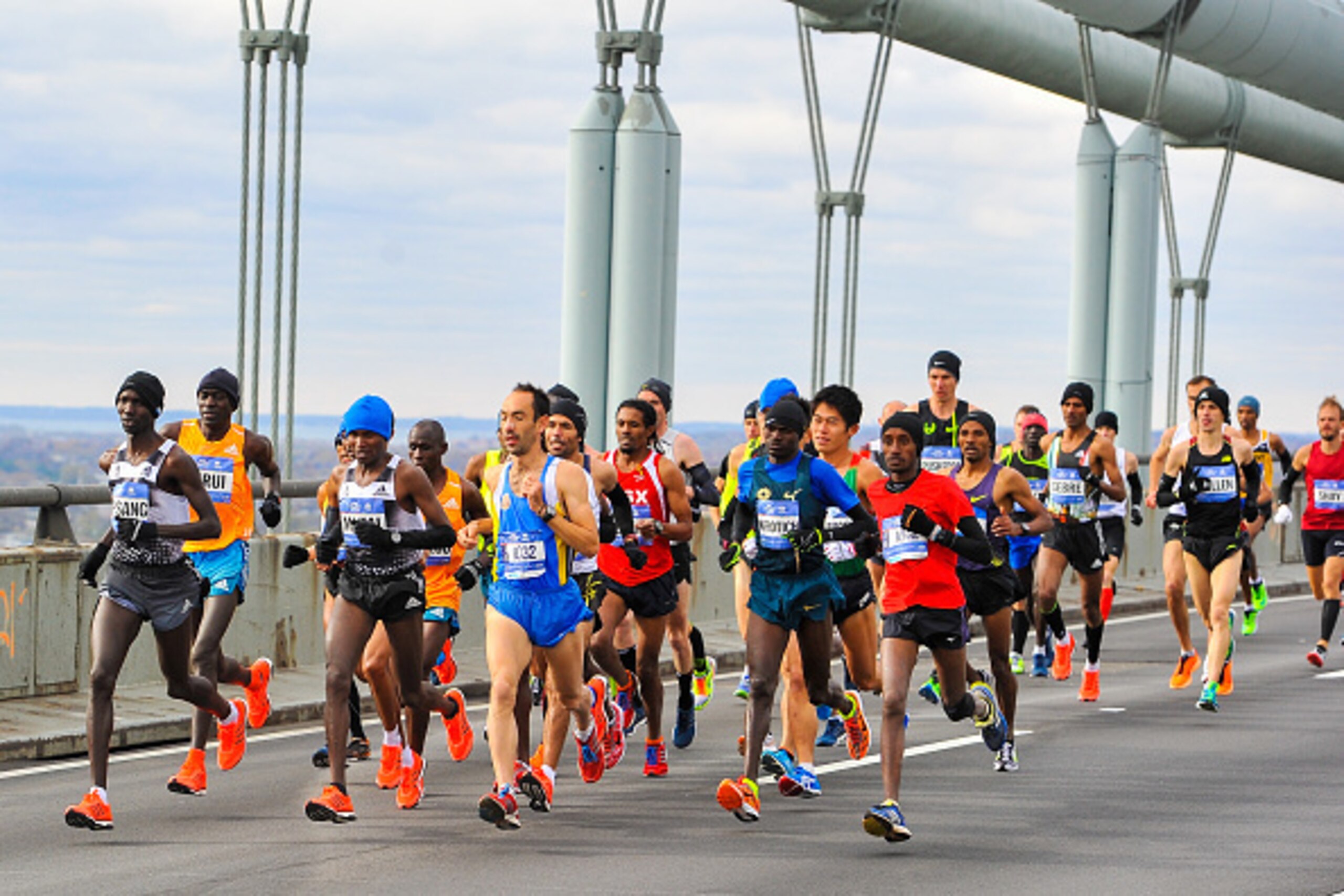 NEW YORK, NY - NOVEMBER 02: Wilson Kipsang leads a group of runners as they cross the Verrazano-Narrows Bridge at the start of the TCS New York City Marathon on November 2, 2014 in the Brooklyn borough of New York City. (Photo by Alex Goodlett/Getty Ima NEW YORK, NY - NOVEMBER 02: Wilson Kipsang leads a group of runners as they cross the Verrazano-Narrows Bridge at the start of the TCS New York City Marathon on November 2, 2014 in the Brooklyn borough of New York City. (Photo by Alex Goodlett/Getty Ima