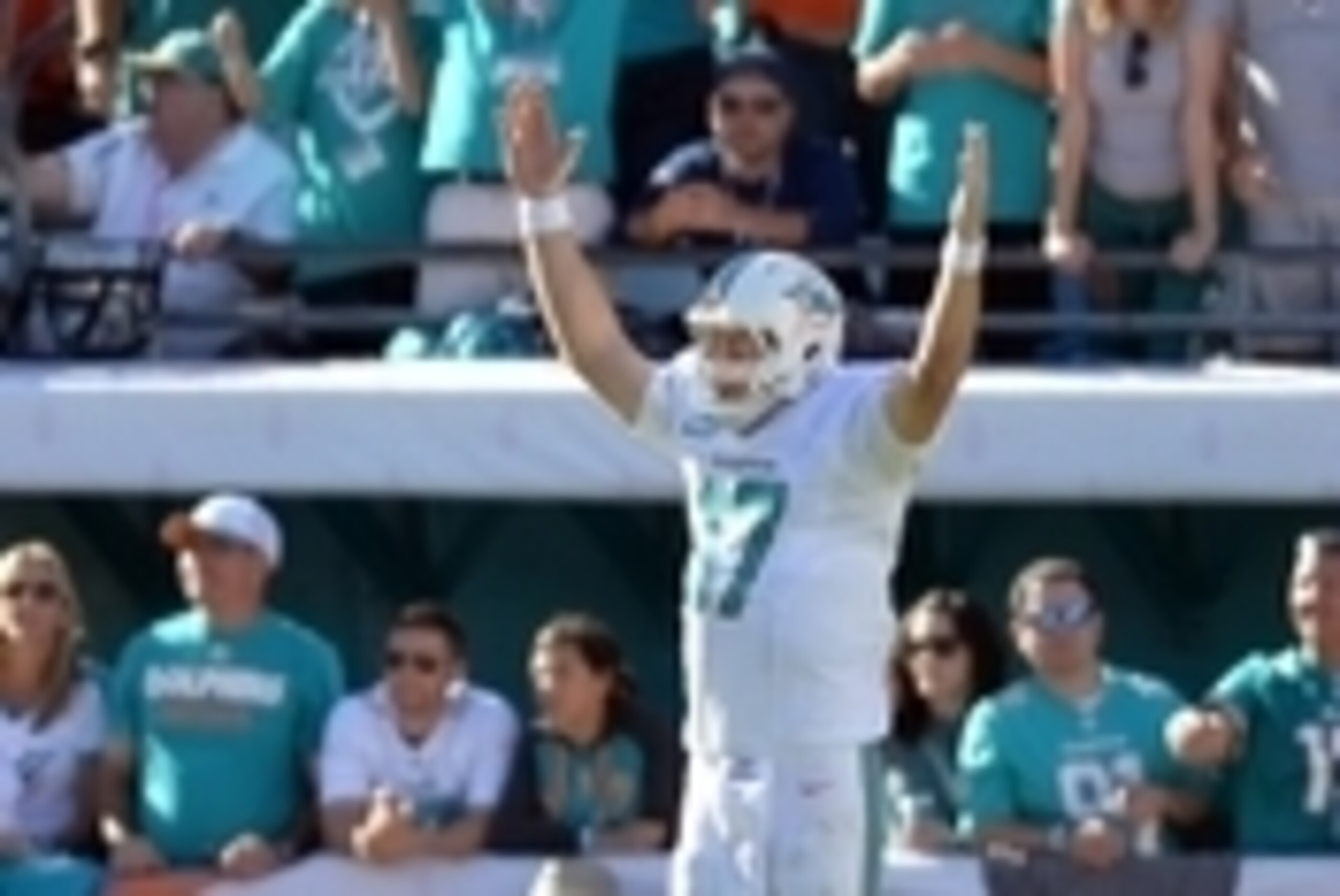 Nov 2, 2014; Miami Gardens, FL, USA; Miami Dolphins quarterback Ryan Tannehill (17) reacts after throwing a touchdown pass against the San Diego Chargers during the second half at Sun Life Stadium. The Dolphins won 37-0. Mandatory Credit: Steve Mitchell-U