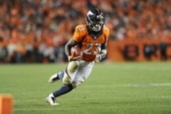 Oct 23, 2014; Denver, CO, USA; Denver Broncos running back Ronnie Hillman (23) carries the ball in the third quarter against the San Diego Chargers at Sports Authority Field at Mile High. Mandatory Credit: Ron Chenoy-USA TODAY Sports
