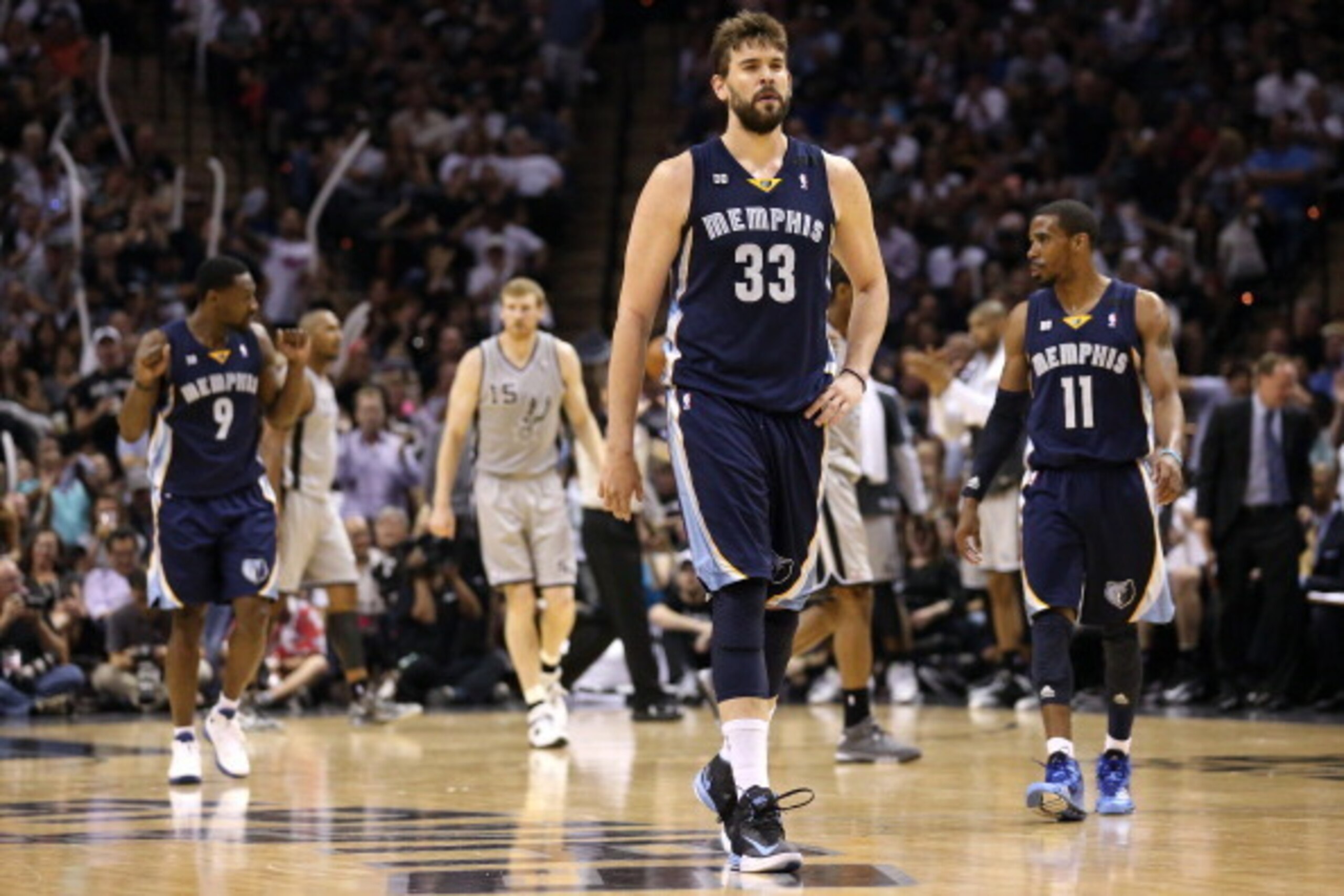 SAN ANTONIO, TX - MAY 21:  Marc Gasol #33 (C), Mike Conley #11 (R) and Tony Allen #9 of the Memphis Grizzlies walk up court dejected against the San Antonio Spurs in the second half during Game Two of the Western Conference Finals of the 2013 NBA Playoffs