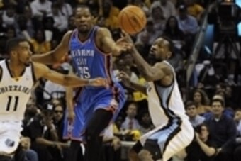 May 1, 2014; Memphis, TN, USA; Memphis Grizzlies guard Mike Conley (11) and Oklahoma City Thunder forward Kevin Durant (35) and Memphis Grizzlies guard Tony Allen (9) fight for the ball during the game in game six of the first round of the 2014 NBA Playof