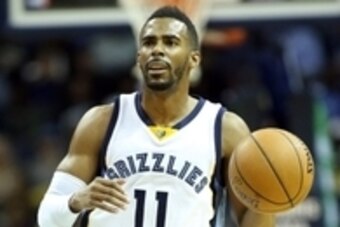 Nov 3, 2014; Memphis, TN, USA; Memphis Grizzlies guard Mike Conley (11) dribbles the ball during the second half against the New Orleans Pelicans at FedExForum. Memphis defeated New Orleans 93-81. Mandatory Credit: Nelson Chenault-USA TODAY Sports