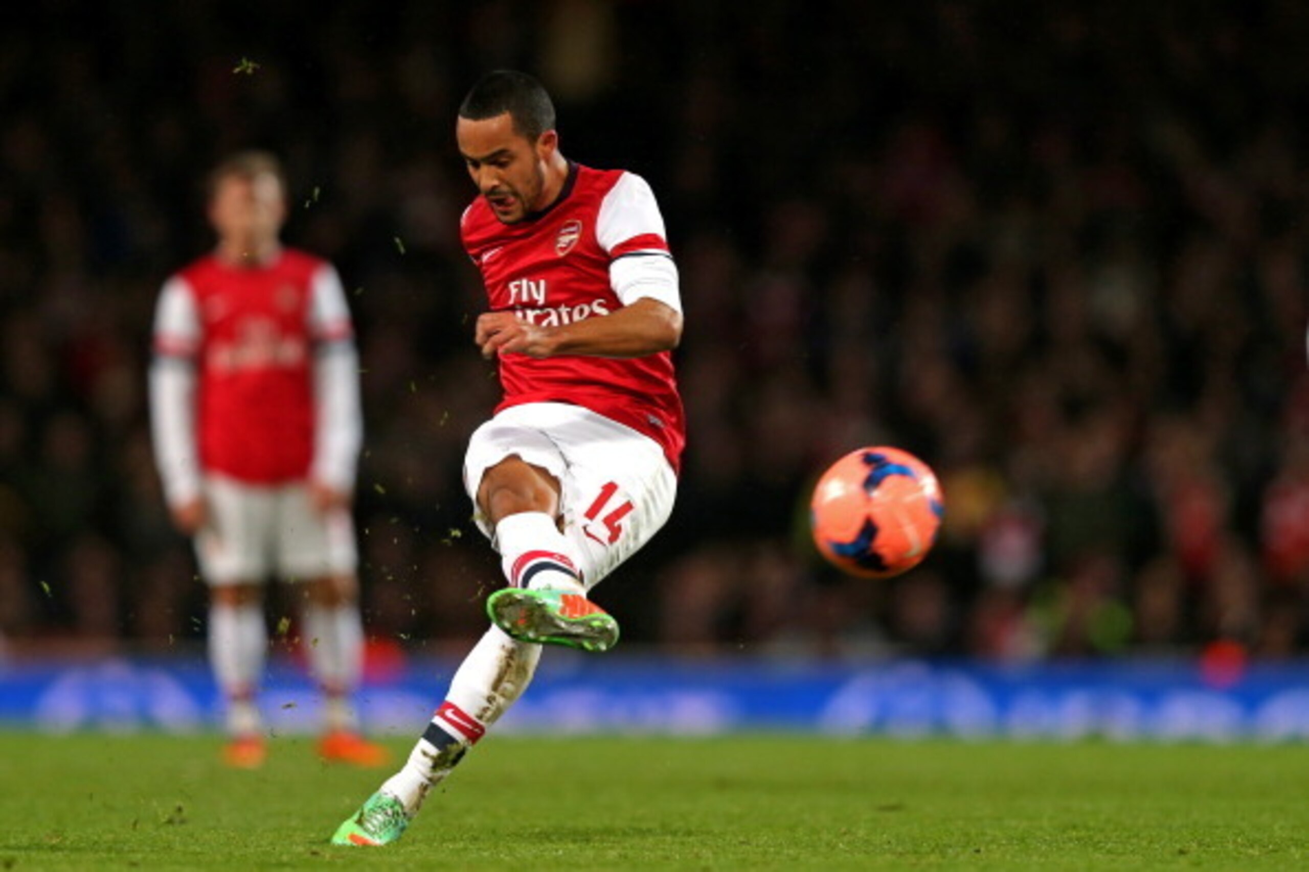 LONDON, ENGLAND - JANUARY 04: Theo Walcott of Arsenal takes a shot on goal during the Budweiser FA Cup match between Arsenal and Tottenham Hotspur at Emirates Stadium on January 4, 2014 in London, England. (Photo by Clive Rose/Getty Images) LONDON, ENGLAND - JANUARY 04: Theo Walcott of Arsenal takes a shot on goal during the Budweiser FA Cup match between Arsenal and Tottenham Hotspur at Emirates Stadium on January 4, 2014 in London, England. (Photo by Clive Rose/Getty Images)