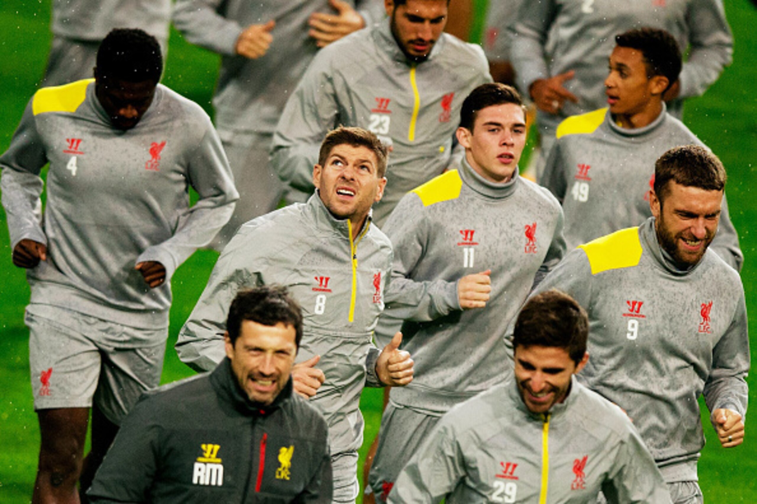 MADRID, SPAIN - NOVEMBER 03: Steven Gerrard of Liverpool FC looks at the rainfall as he exercises with teammates during the training session ahead of the UEFA Champions League Group B match between Real Madrid CF and Liverpool FC at Estadio Santiago Berna