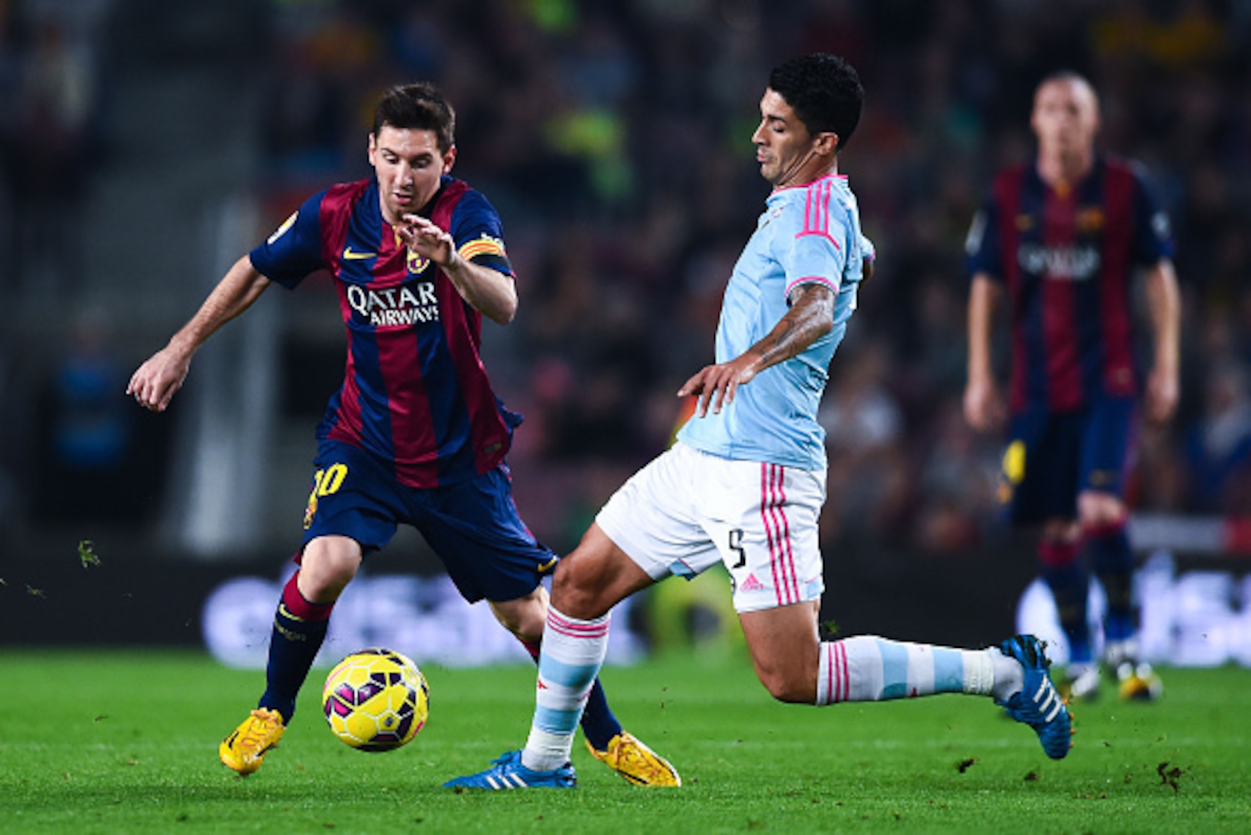 BARCELONA, SPAIN - NOVEMBER 01:  Lionel Messi of FC Barcelona competes for the ball with Charles of Celta de Vigo the La Liga match between FC Barcelona and Celta de Vigo at Camp Nou on November 1, 2014 in Barcelona, Spain.  (Photo by David Ramos/Getty Im
