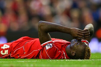 LIVERPOOL, ENGLAND - OCTOBER 25:  Mario Balotelli of Liverpool shows his frustration during the Barclays Premier League match between Liverpool and Hull City at Anfield on October 25, 2014 in Liverpool, England.  (Photo by Alex Livesey/Getty Images)