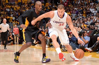 LOS ANGELES, CA - OCTOBER 31: Blake Griffin #32 of the Los Angeles Clippers handles the ball against the Los Angeles Lakers on October 31, 2014 at STAPLES Center in Los Angeles, California. NOTE TO USER: User expressly acknowledges and agrees that, by dow