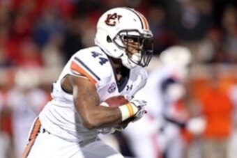 Nov 1, 2014; Oxford, MS, USA; Auburn Tigers running back Cameron Artis-Payne (44) rushes during the third quarter against the Ole Miss Rebels at Vaught-Hemingway Stadium. Mandatory Credit: Nelson Chenault-USA TODAY Sports