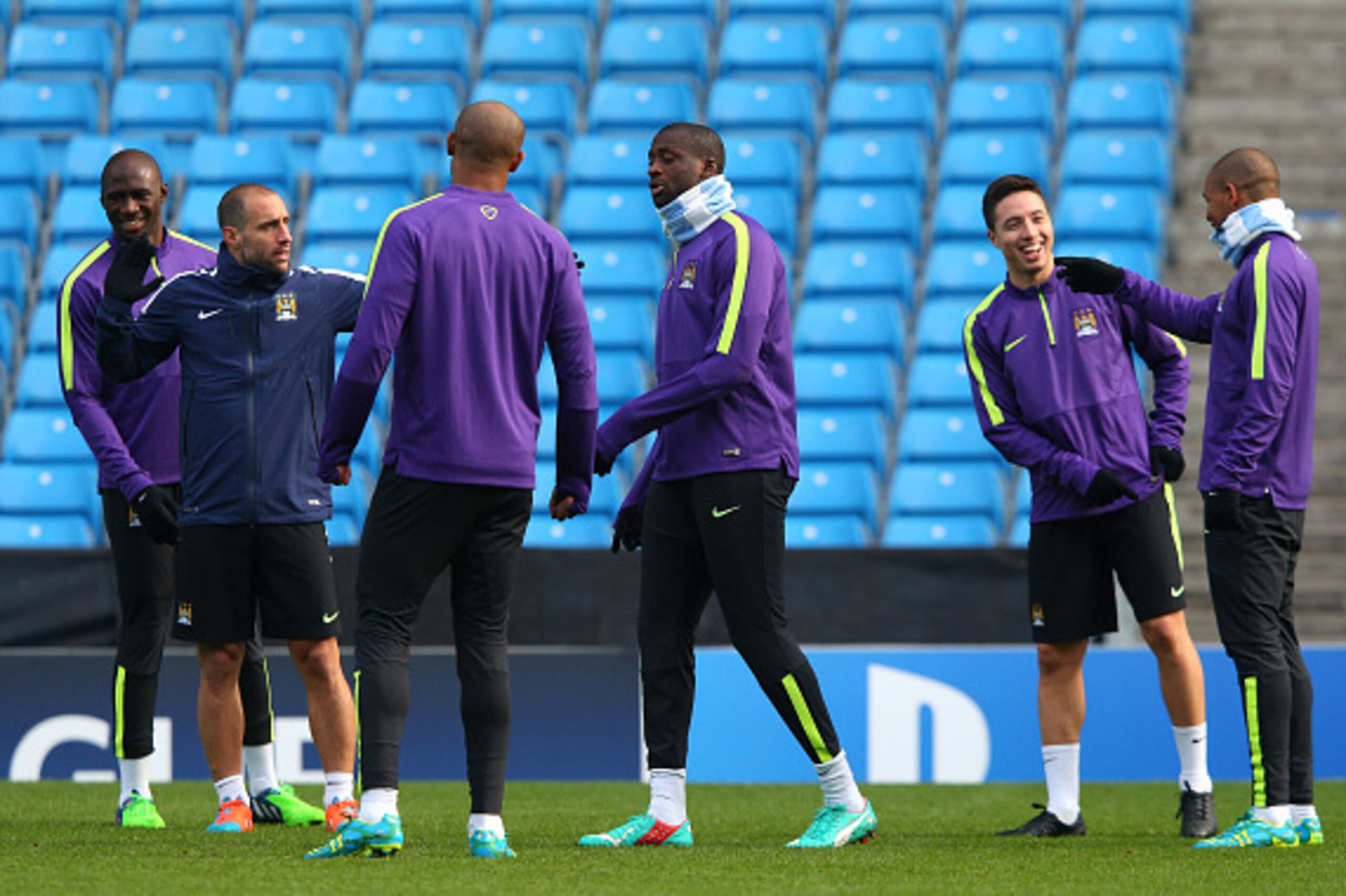 MANCHESTER, ENGLAND - NOVEMBER 04:  The players of of Manchester City joke around during a training session at the Etihad Stadium on November 4, 2014 in Manchester, England.  (Photo by Alex Livesey/Getty Images)