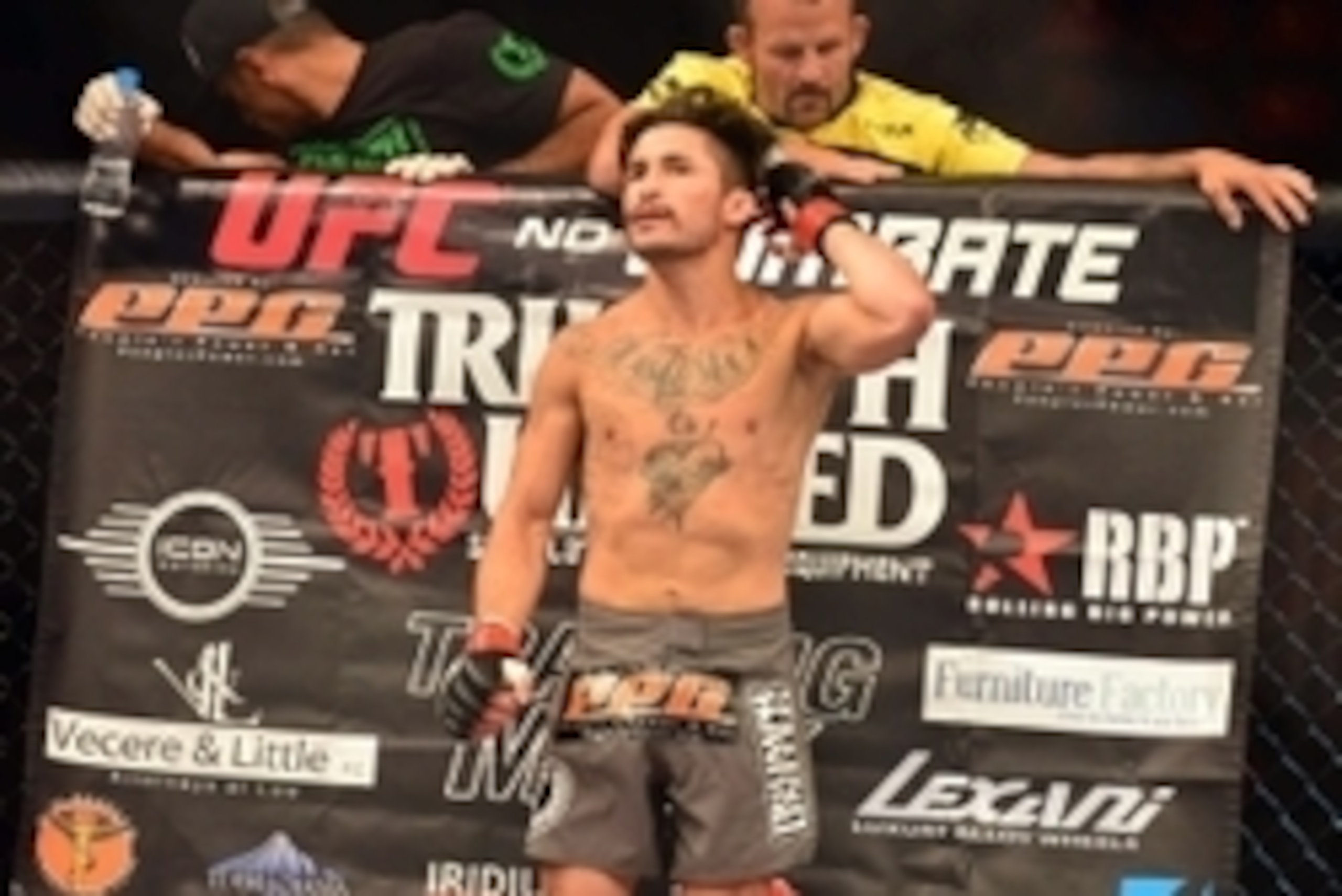 Aug 3, 2013; Rio De Janeiro, Brazil; Ian McCall (red gloves) in his corner during his fight against Iliarde Santos during UFC 163 at HSBC Arena. Mandatory Credit: Jason Silva-USA TODAY Sports