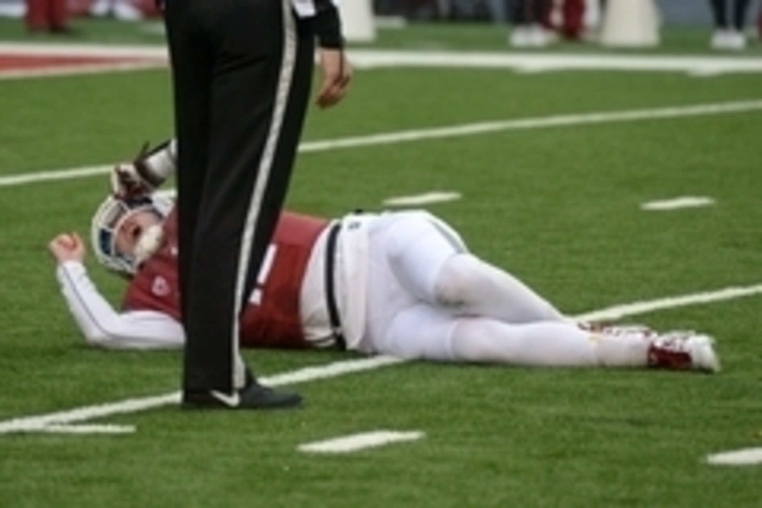 Nov 1, 2014; Pullman, WA, USA; Washington State Cougars quarterback Connor Halliday (12) reacts after suffering a leg injury against the Southern California Trojans at Martin Stadium. Mandatory Credit: Kirby Lee-USA TODAY Sports