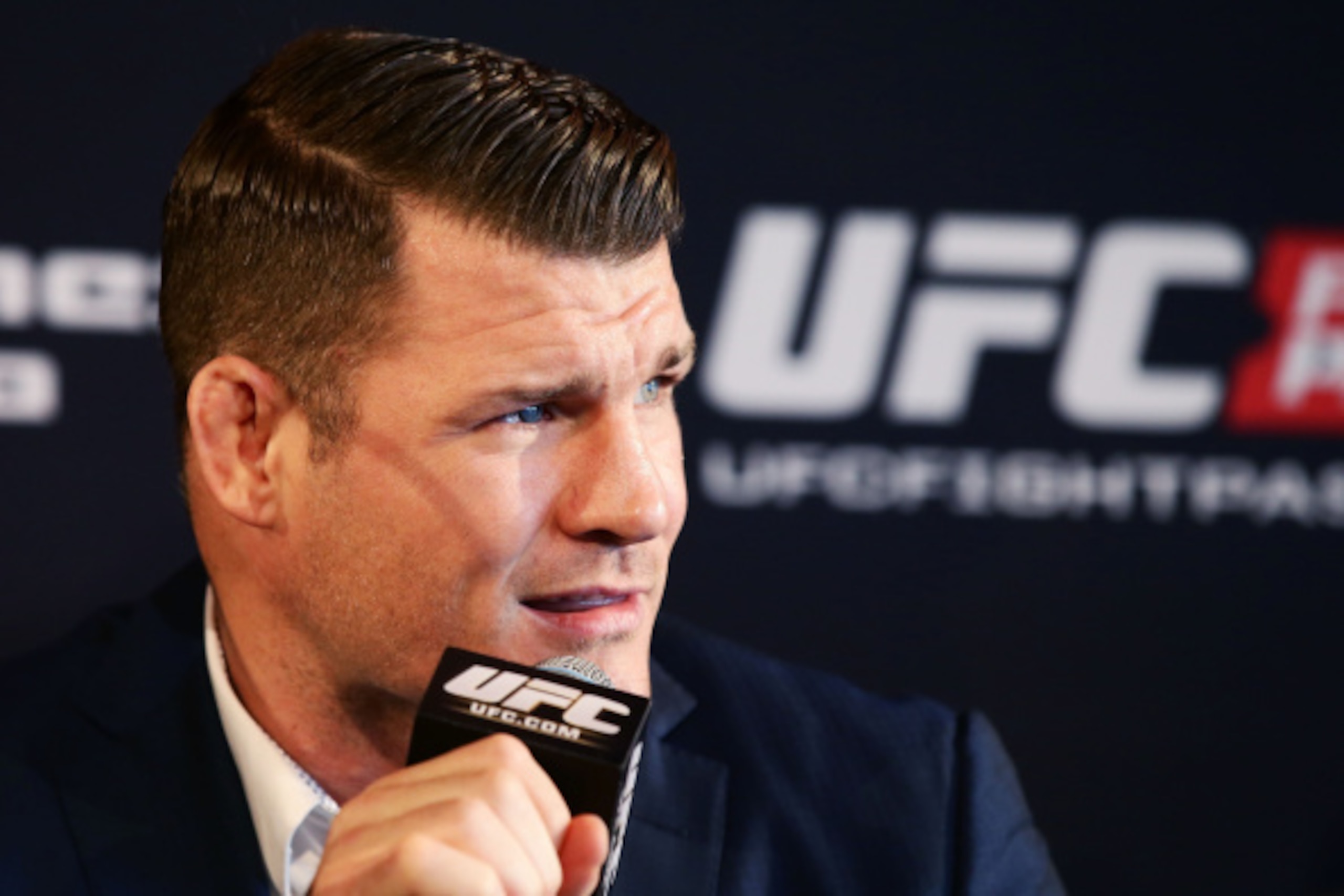 SYDNEY, AUSTRALIA - SEPTEMBER 11:  Michael Bisping speaks during the UFC Fight Night: Rockhold v Bisping Press Event at Museum of Contemporary Art on September 11, 2014 in Sydney, Australia.  (Photo by Matt King/Getty Images)