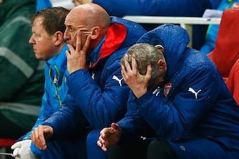 LONDON, ENGLAND - NOVEMBER 04:  Arsene Wenger, manager of Arsenal reacts on the bench as a 3-0 lead is lost during the UEFA Champions League Group D match between Arsenal FC and RSC Anderlecht at Emirates Stadium on November 4, 2014 in London, United King