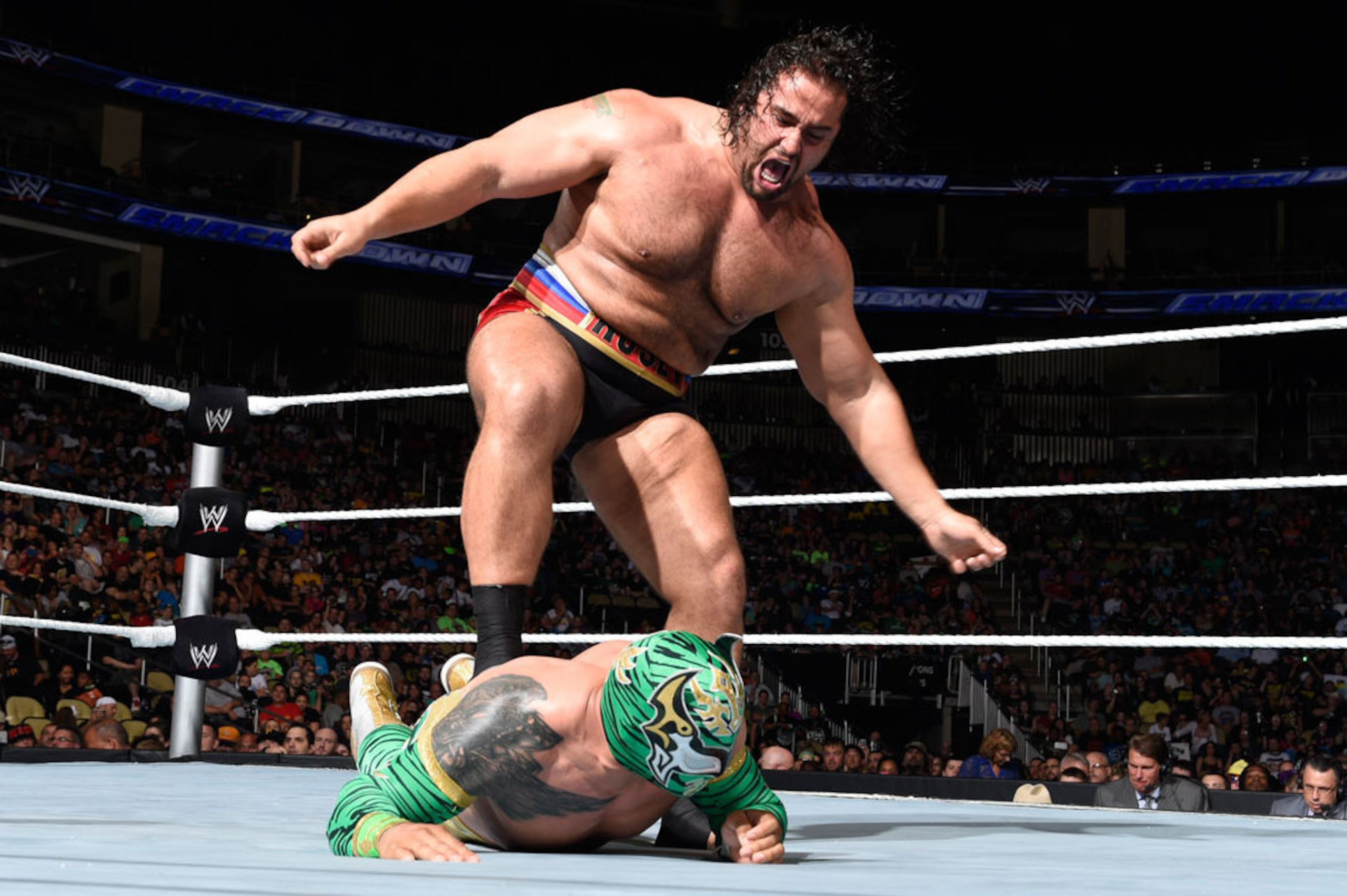 Rusev attacks Sin Cara