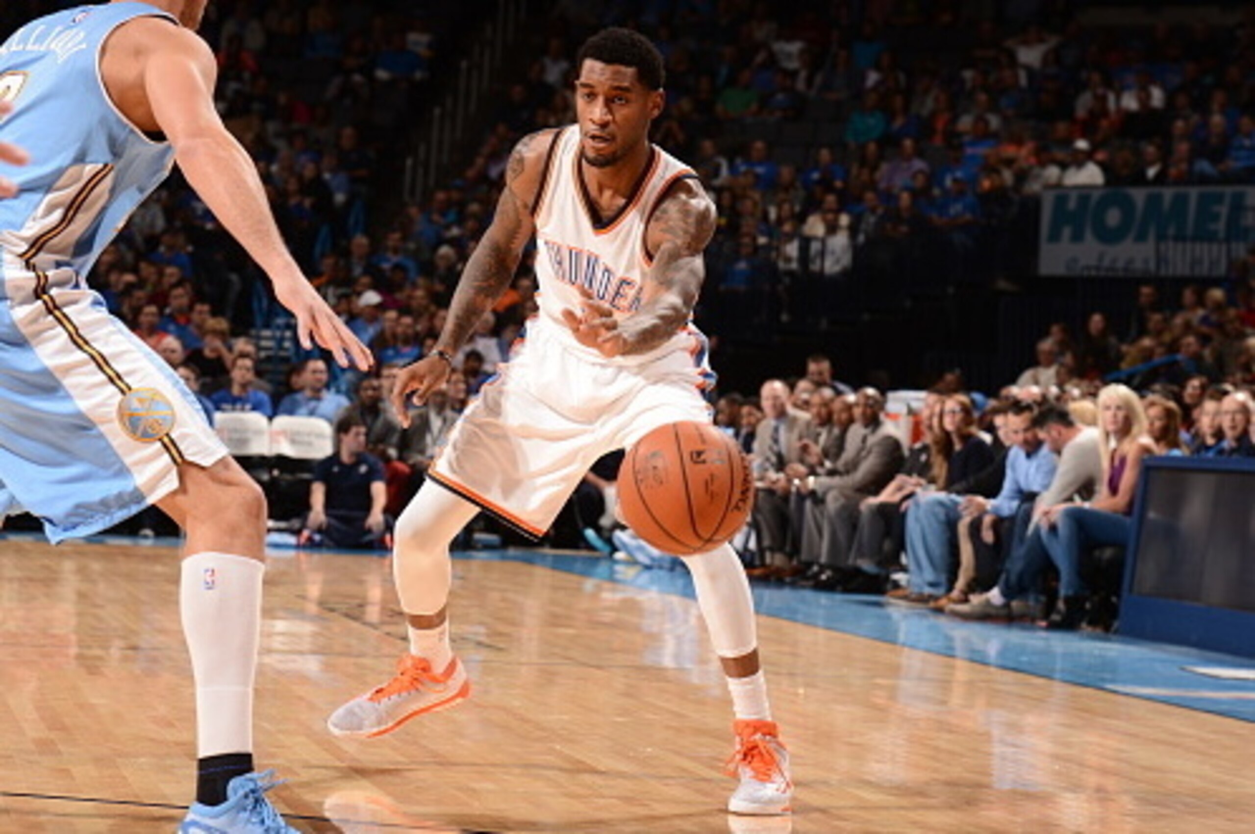 OKLAHOMA CITY, OK - NOVEMBER 1: Perry Jones #3 of the Oklahoma City Thunder passes the ball against the Denver Nuggets during the game at the Chesapeake Energy Arena on November 1, 2014 in Oklahoma City, Oklahoma. NOTE TO USER: User expressly acknowledges