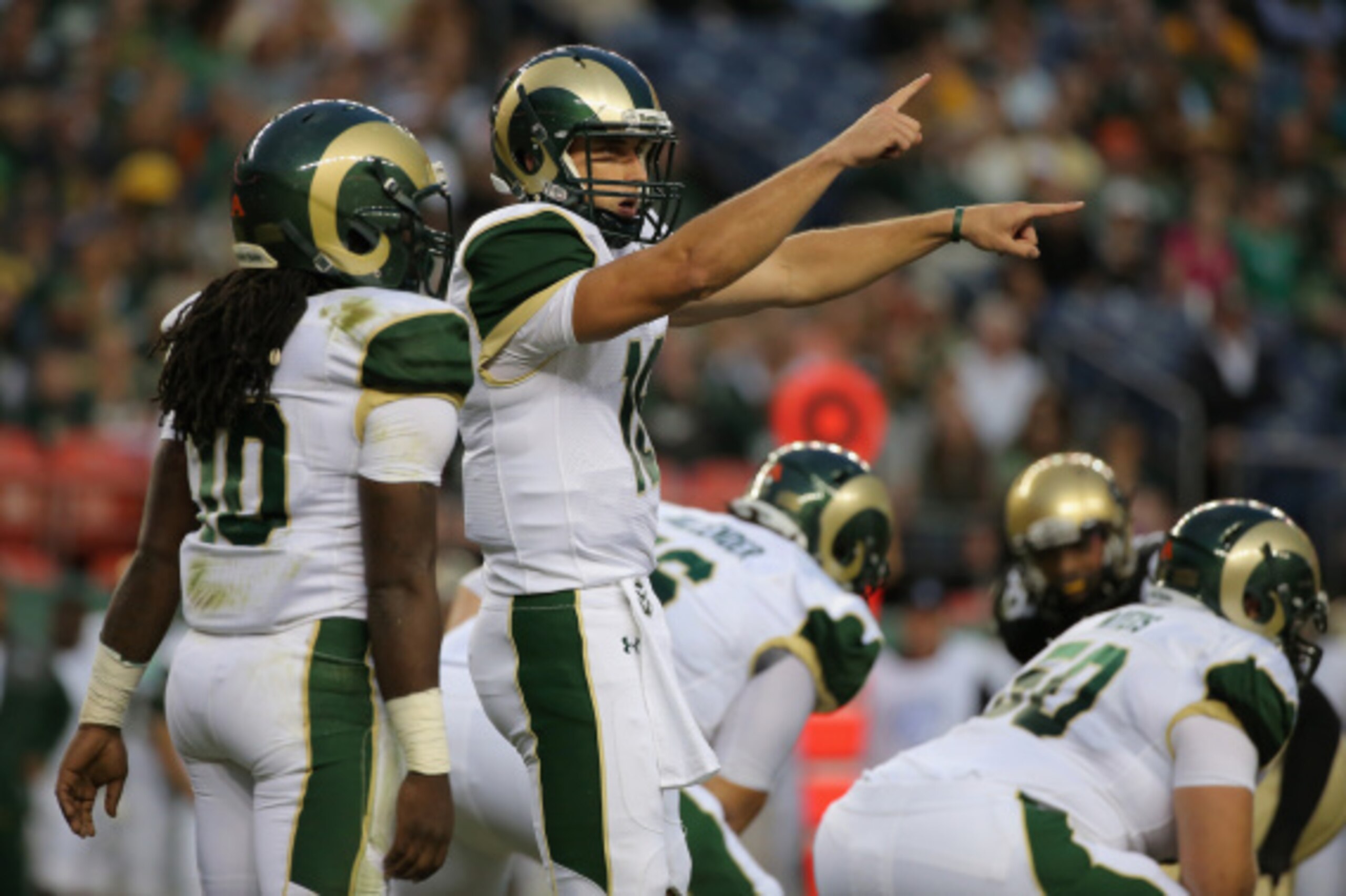 DENVER, CO - AUGUST 29: Quarterback Garrett Grayson #18 of the Colorado State Rams runs the offense against the Colorado Buffaloes in the Rocky Mountain Showdown at Sports Authority Field at Mile High on August 29, 2014 in Denver, Colorado. The Colorado DENVER, CO - AUGUST 29: Quarterback Garrett Grayson #18 of the Colorado State Rams runs the offense against the Colorado Buffaloes in the Rocky Mountain Showdown at Sports Authority Field at Mile High on August 29, 2014 in Denver, Colorado. The Colorado