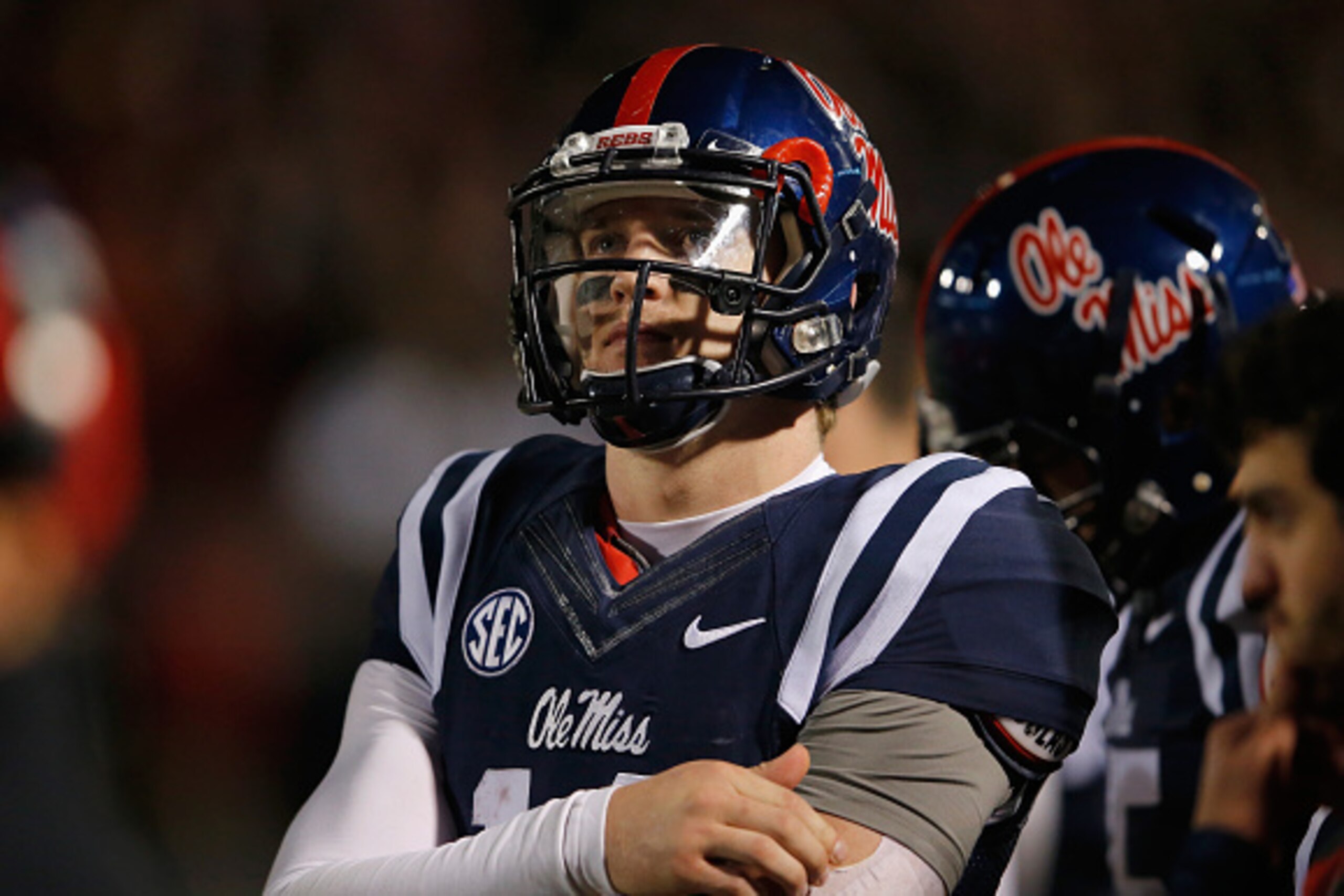 OXFORD, MS - NOVEMBER 01:  Quarterback Bo Wallace #14 of the Mississippi Rebels looks on from the bench against the Auburn Tigers at Vaught-Hemingway Stadium on November 1, 2014 in Oxford, Mississippi. Auburn defeated Mississippi 35-31.  (Photo by Doug Pe