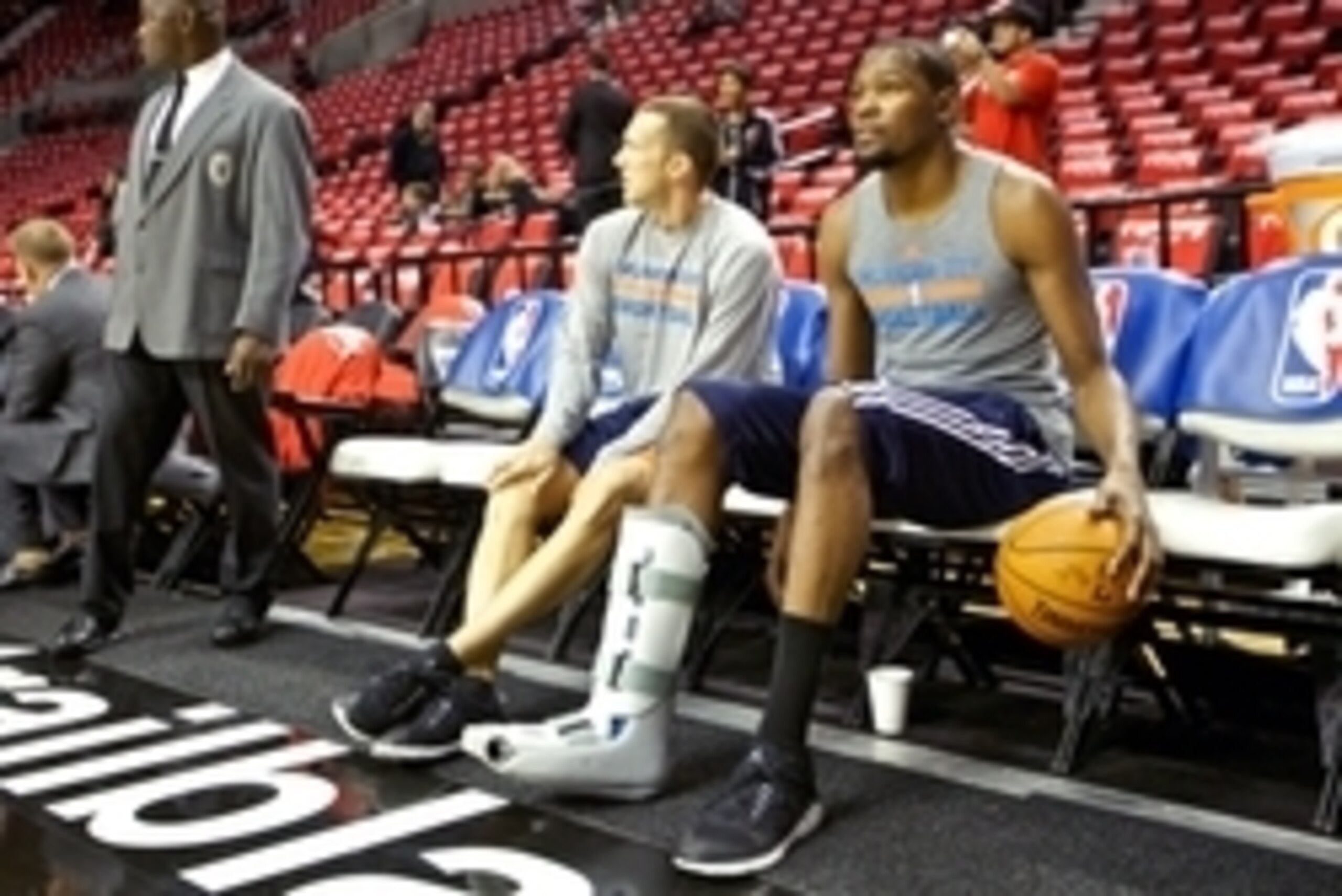 Oct 29, 2014; Portland, OR, USA; Oklahoma City Thunder forward Kevin Durant (35) dribbles a ball on the bench while wearing a boot on his leg before a game against the Portland Trail Blazers at the Moda Center. Mandatory Credit: Craig Mitchelldyer-USA TOD