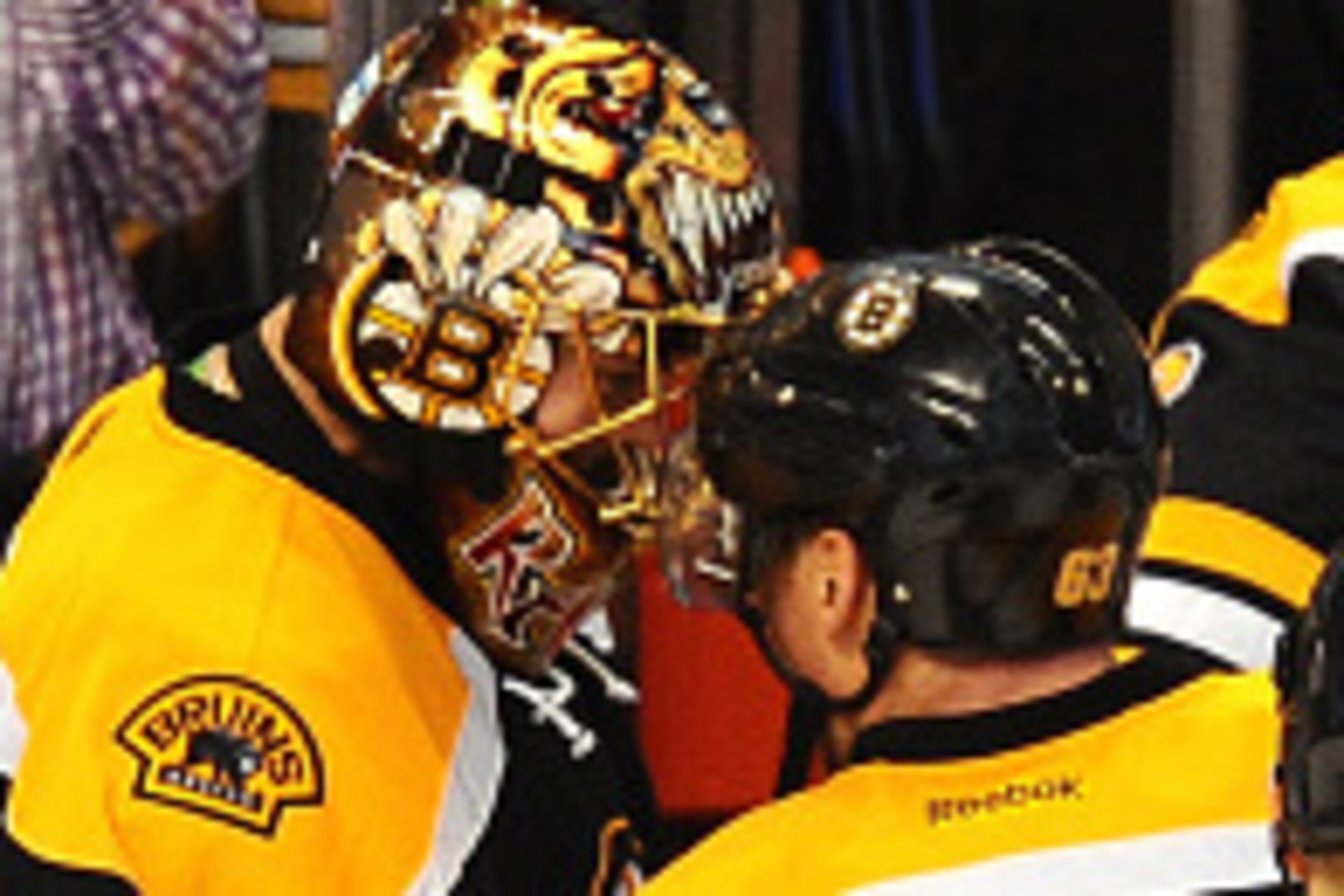 BOSTON, MA - NOVEMBER 4: Tuukka Rask #40 and Brad Marchand #63 of the Boston Bruins celebrate the overtime win against the Florida Panthers at the TD Garden on November 4, 2014 in Boston, Massachusetts.  (Photo by Steve Babineau/NHLI via Getty Images)