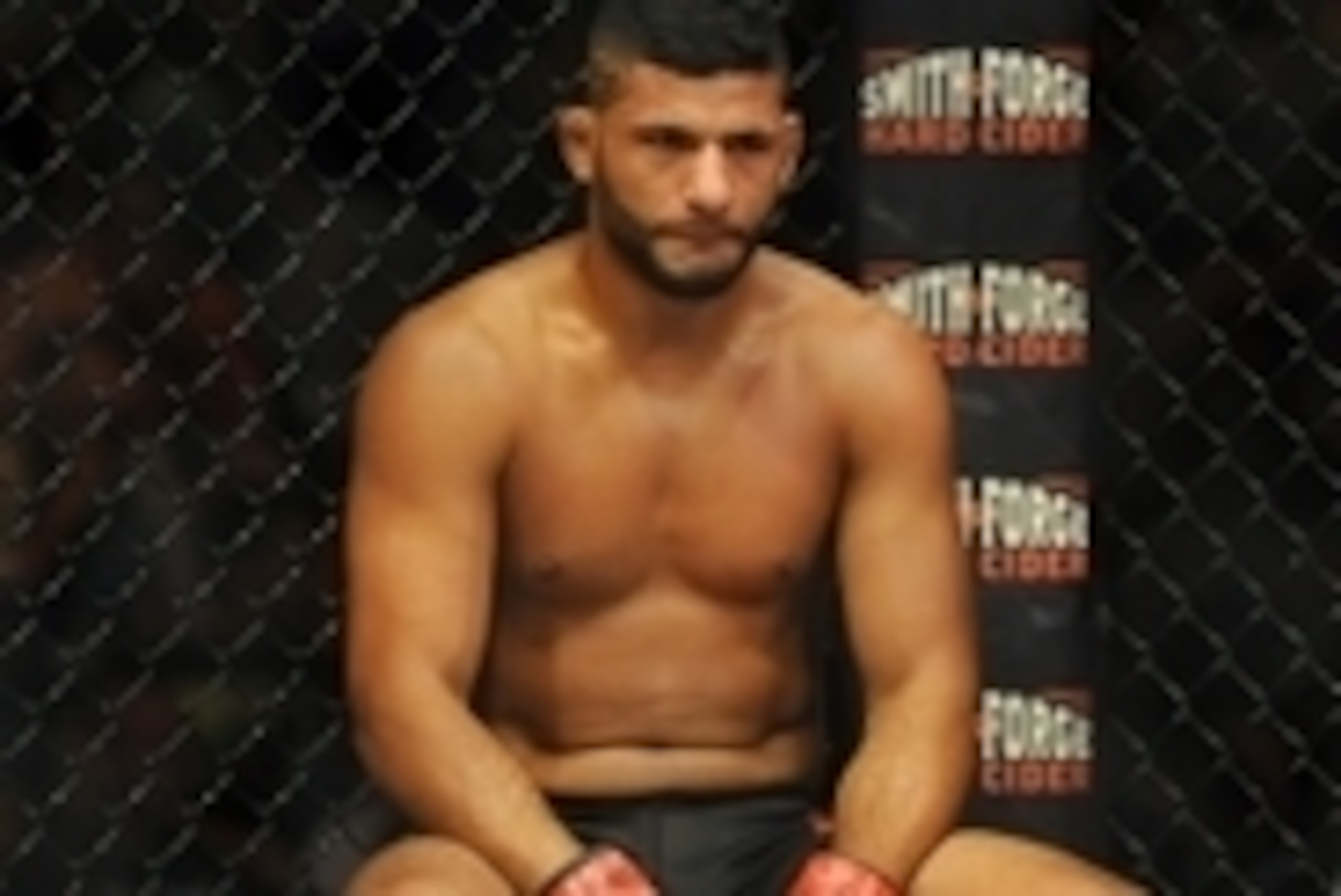 Jul 6, 2014; Las Vegas, NV, USA; Dhiego Lima sits in defeat after a knockout loss by Eddie Gordon (not pictured) during the first round of an Ultimate Fighter middleweight title fight at Mandalay Bay Events Center. Mandatory Credit: Stephen R. Sylvanie-US