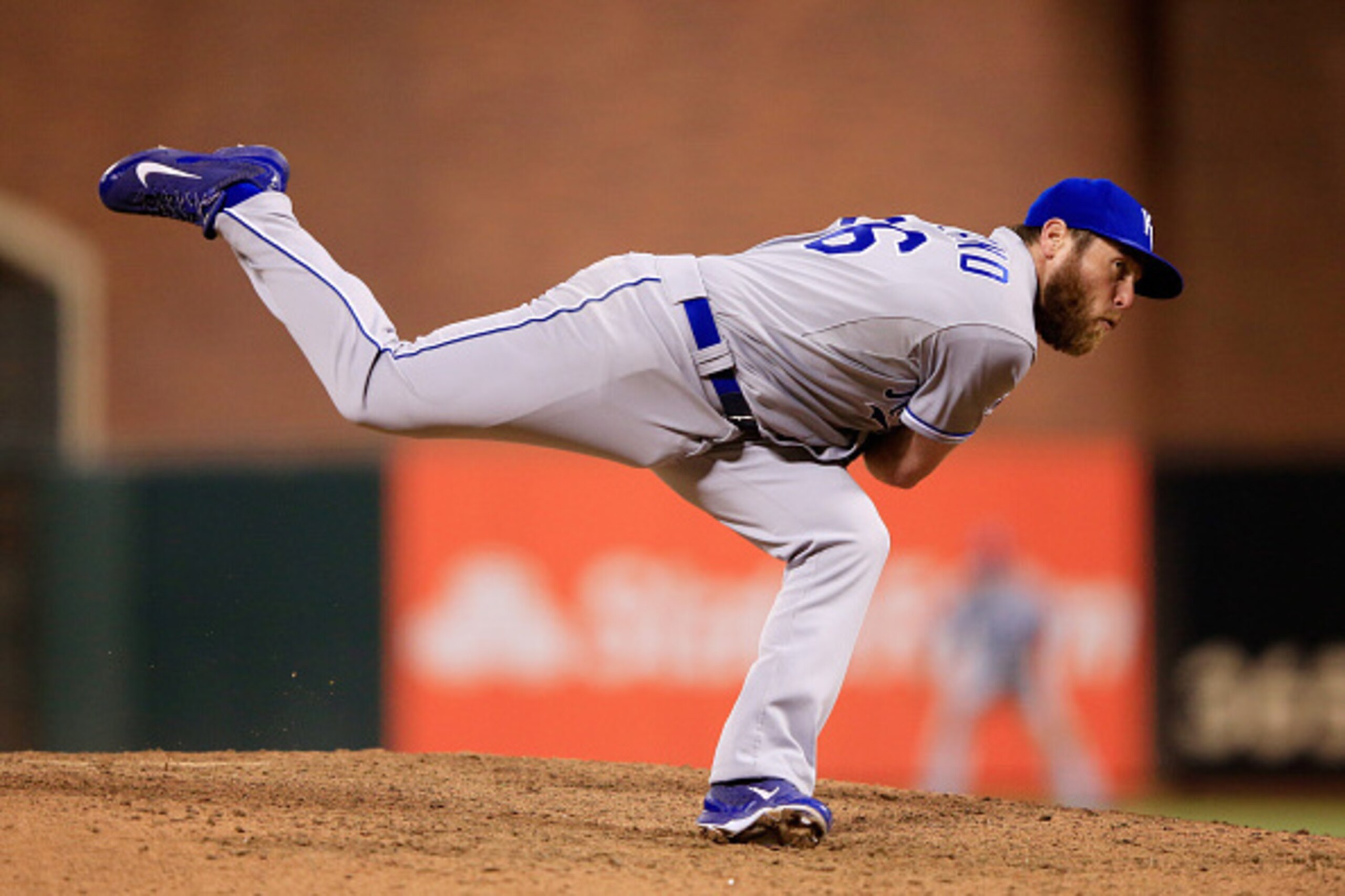 SAN FRANCISCO, CA - OCTOBER 24:  Greg Holland #56 of the Kansas City Royals pitches in the ninth inning against the San Francisco Giants during Game Three of the 2014 World Series at AT&T Park on October 24, 2014 in San Francisco, California.  (Photo by J