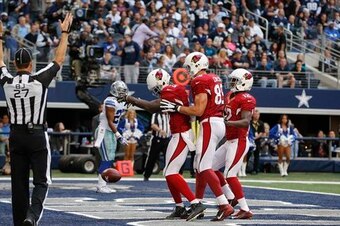 Wide receiver Jaron Brown (left) scored one of four red-zone touchdowns in a Week 9 victory over the Cowboys.