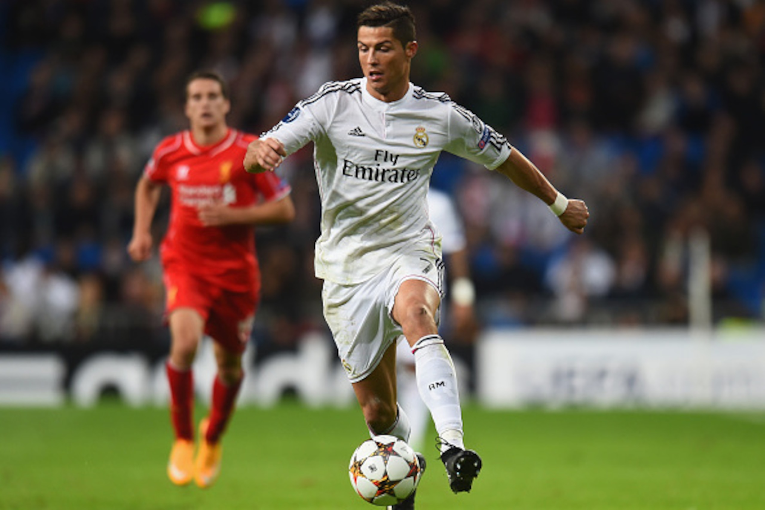 MADRID, SPAIN - NOVEMBER 04: Cristiano Ronaldo of Real Madrid runs with the ball during the UEFA Champions League Group B match between Real Madrid and Liverpool at Estadio Santiago Bernabeu on November 4, 2014 in Madrid, Spain. (Photo by Shaun Botteril MADRID, SPAIN - NOVEMBER 04: Cristiano Ronaldo of Real Madrid runs with the ball during the UEFA Champions League Group B match between Real Madrid and Liverpool at Estadio Santiago Bernabeu on November 4, 2014 in Madrid, Spain. (Photo by Shaun Botteril