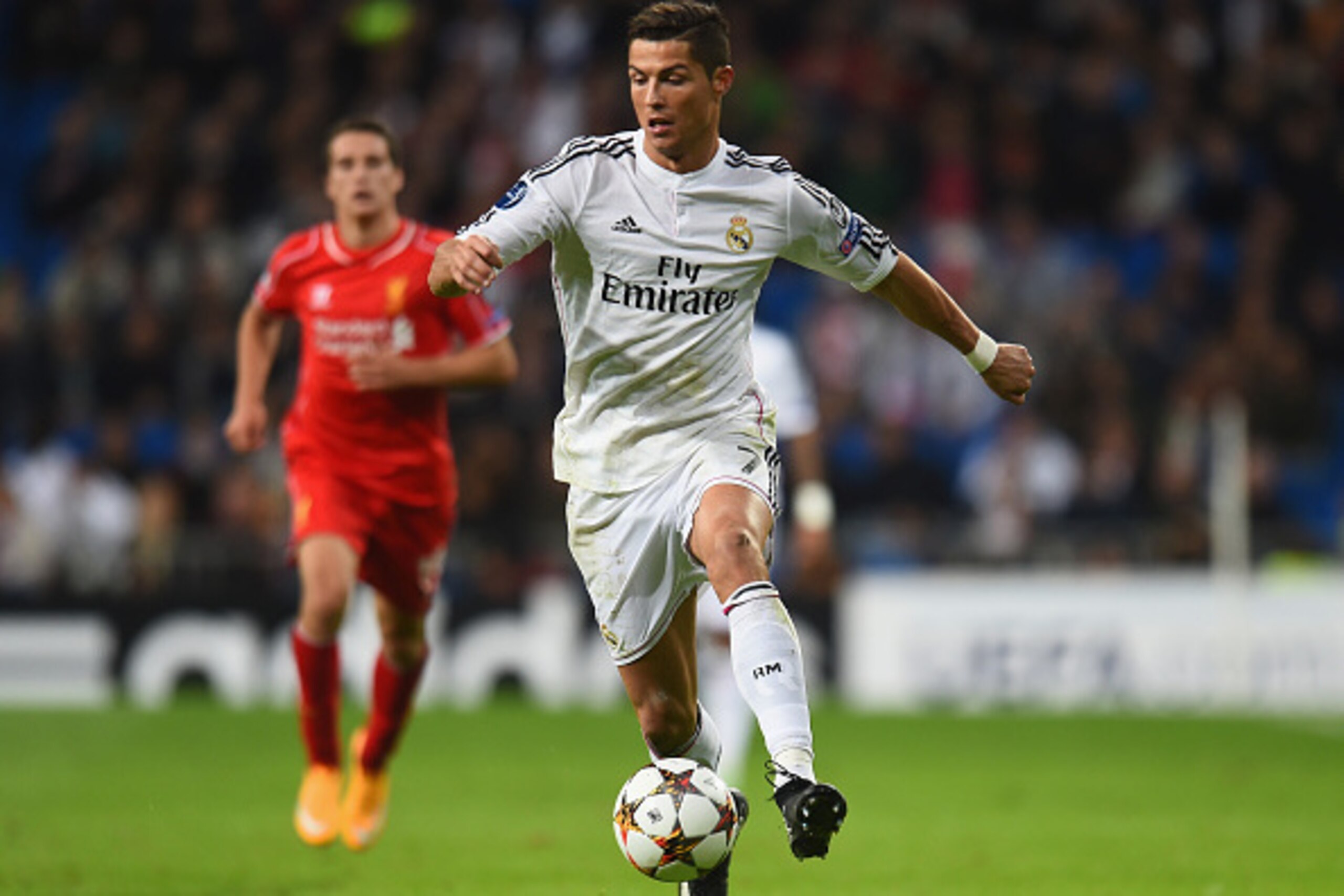 MADRID, SPAIN - NOVEMBER 04: Cristiano Ronaldo of Real Madrid runs with the ball during the UEFA Champions League Group B match between Real Madrid and Liverpool at Estadio Santiago Bernabeu on November 4, 2014 in Madrid, Spain. (Photo by Shaun Botteril MADRID, SPAIN - NOVEMBER 04: Cristiano Ronaldo of Real Madrid runs with the ball during the UEFA Champions League Group B match between Real Madrid and Liverpool at Estadio Santiago Bernabeu on November 4, 2014 in Madrid, Spain. (Photo by Shaun Botteril