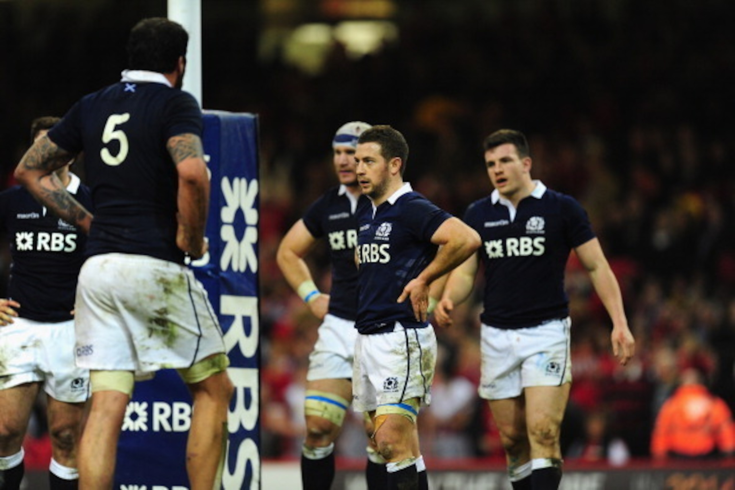CARDIFF, WALES - MARCH 15: Greig Laidlaw of Scotland and team mates look on dejectedly after a Wales try during the RBS Six Nations match between Wales and Scotland at Milleninum Stadium on March 15, 2014 in Cardiff, Wales.  (Photo by Stu Forster/Getty Im