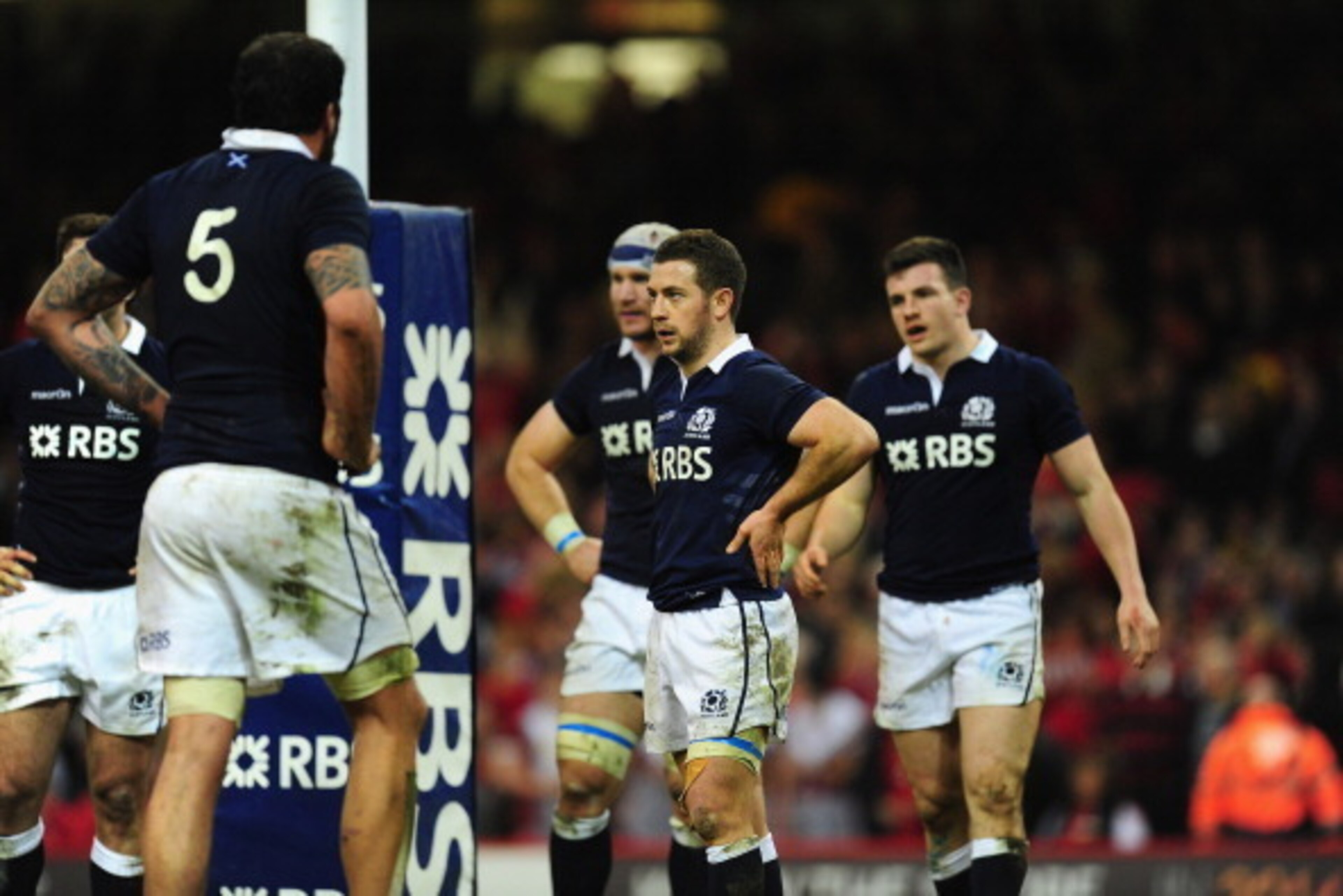 CARDIFF, WALES - MARCH 15: Greig Laidlaw of Scotland and team mates look on dejectedly after a Wales try during the RBS Six Nations match between Wales and Scotland at Milleninum Stadium on March 15, 2014 in Cardiff, Wales.  (Photo by Stu Forster/Getty Im