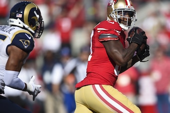 SANTA CLARA, CA - NOVEMBER 02: Anquan Boldin #81 of the San Francisco 49ers scores a touchdown past T.J. McDonald #25 of the St. Louis Rams during the second quarter at Levi's Stadium on November 2, 2014 in Santa Clara, California.  (Photo by Thearon W. H