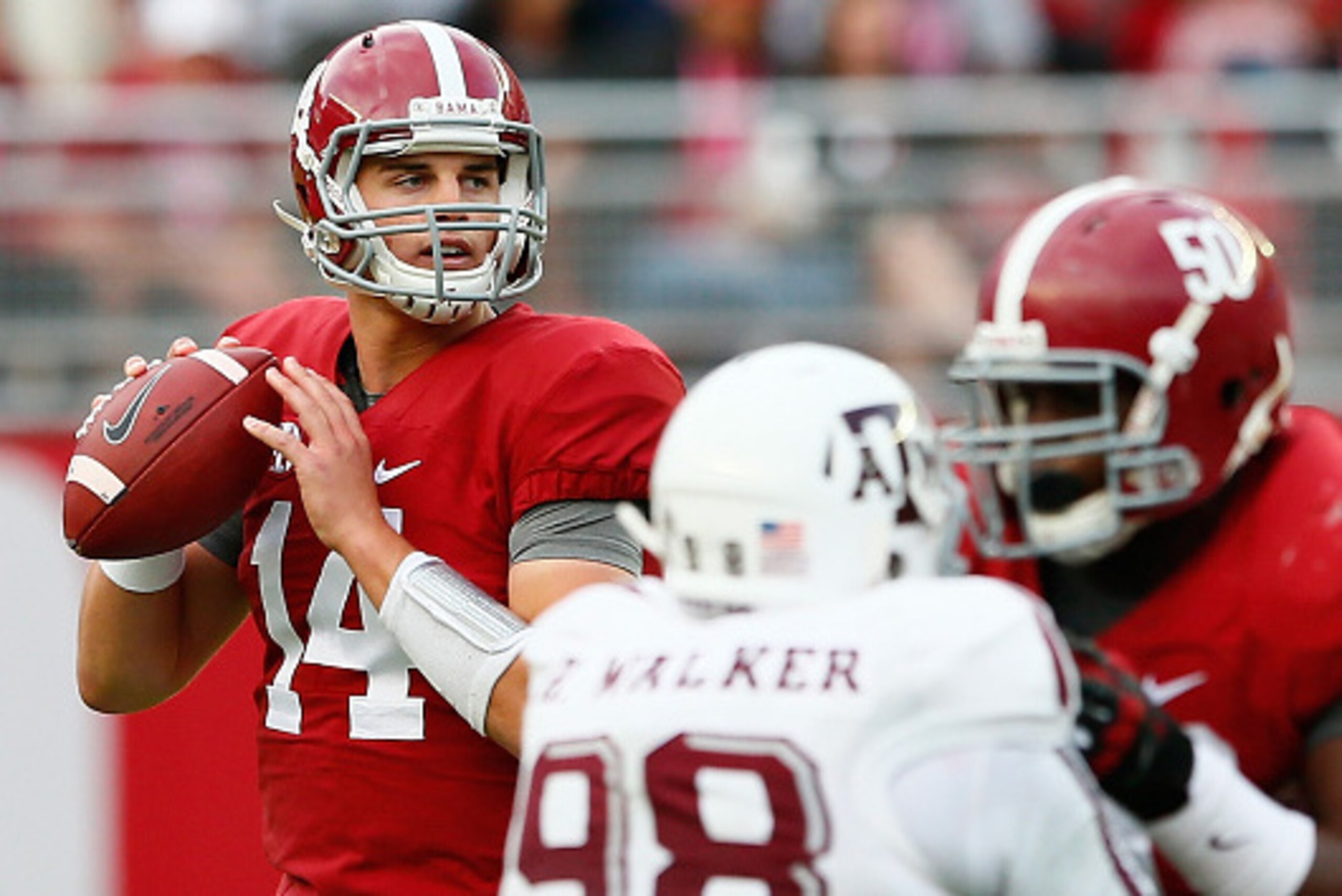 TUSCALOOSA, AL - OCTOBER 18:  Jake Coker #14 of the Alabama Crimson Tide looks to pass against the Texas A&M Aggies at Bryant-Denny Stadium on October 18, 2014 in Tuscaloosa, Alabama.  (Photo by Kevin C. Cox/Getty Images)